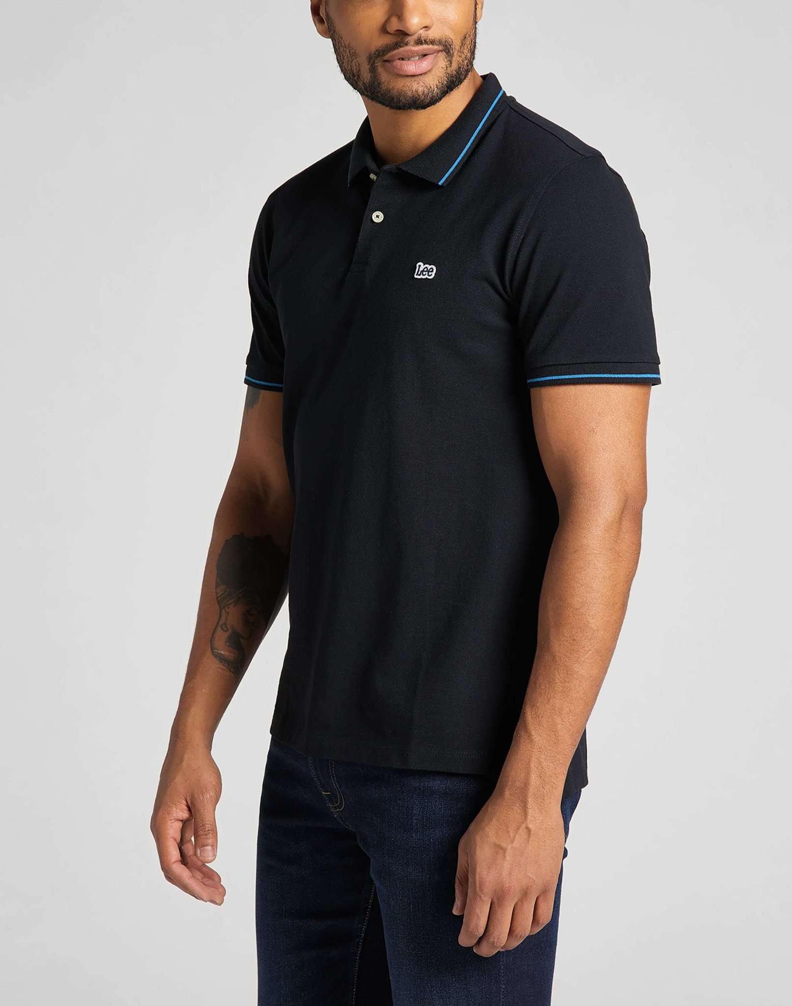 Polo in piqué di colore nero Lee