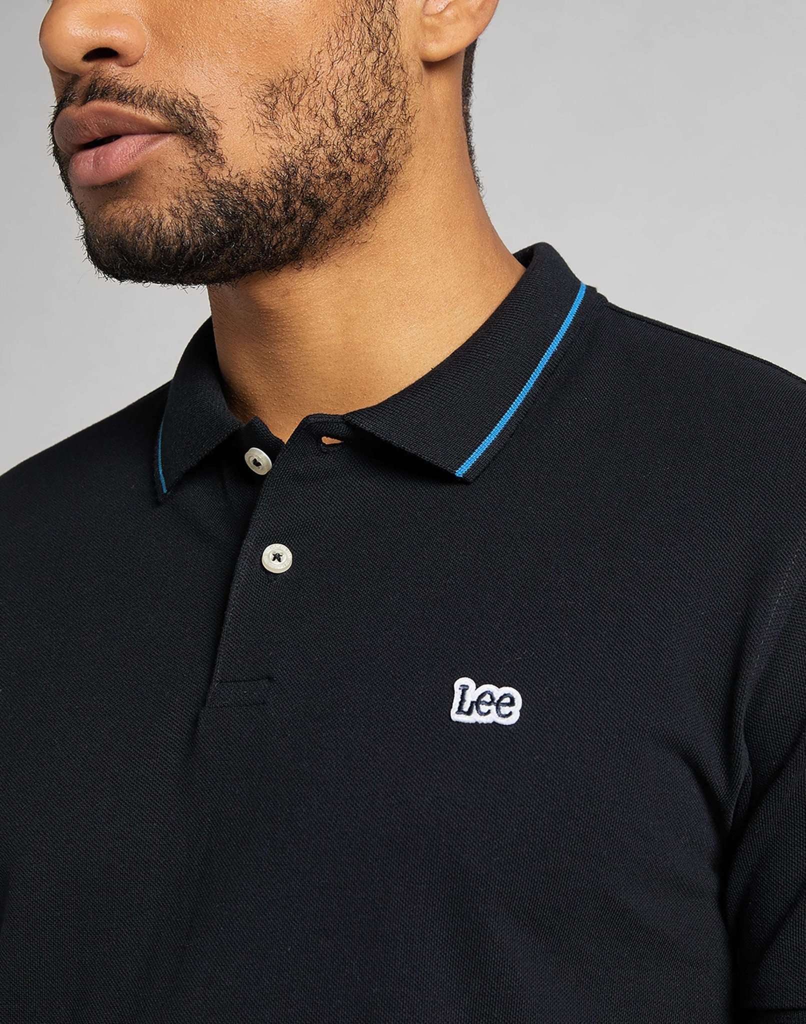 Polo in piqué di colore nero Lee