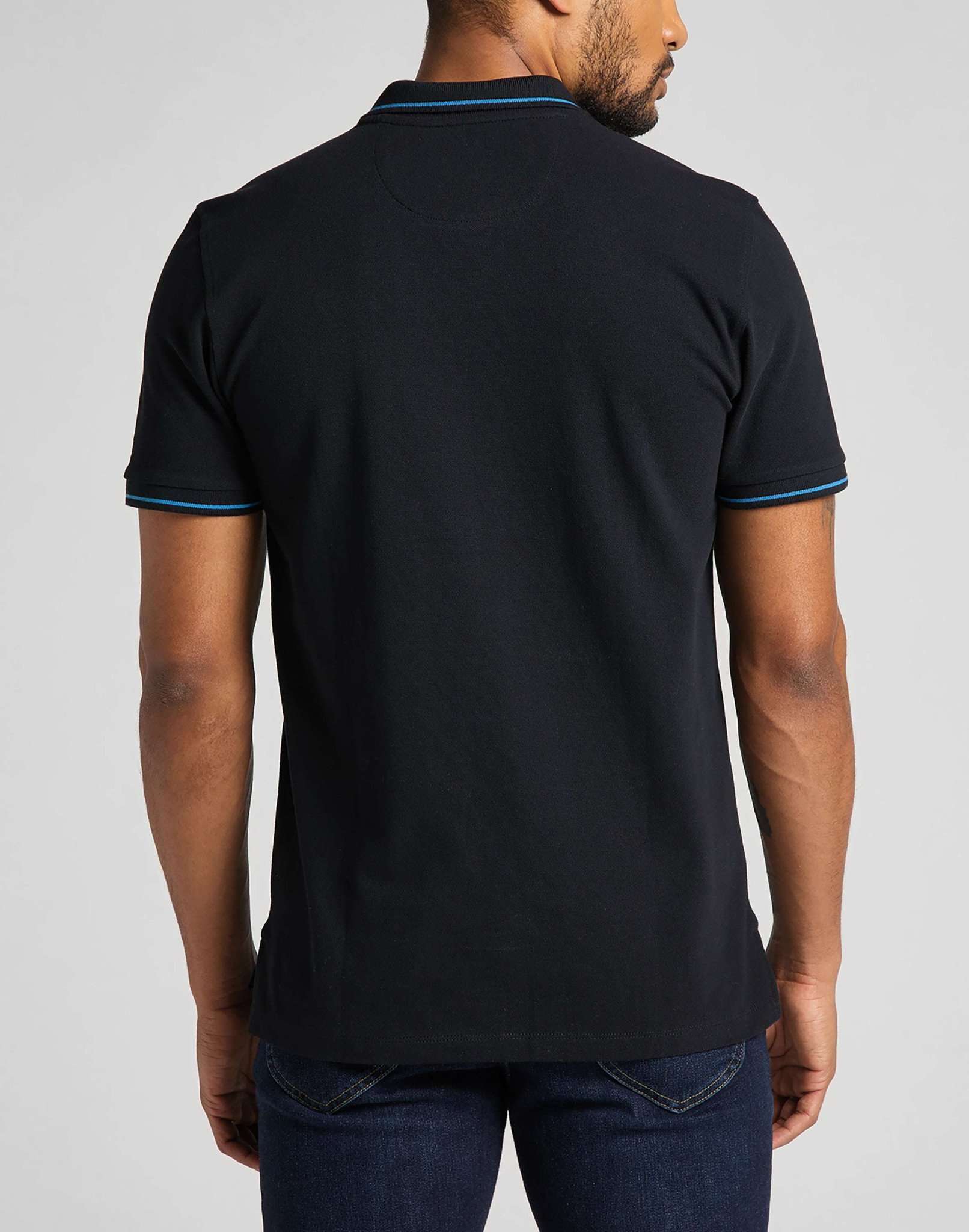 Polo in piqué di colore nero Lee