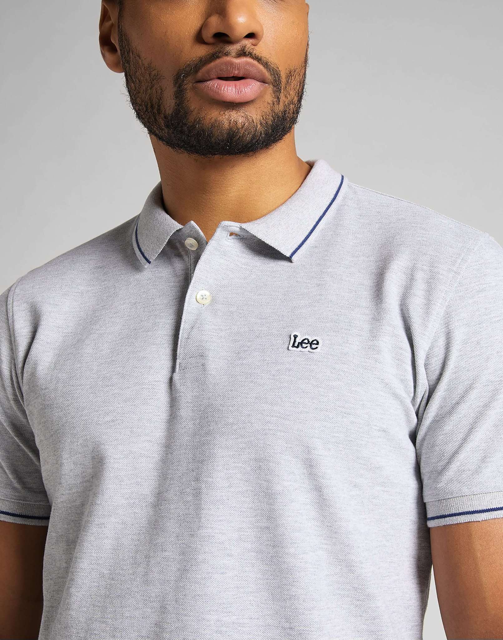 Polo in piqué in grigio melange lucido Lee