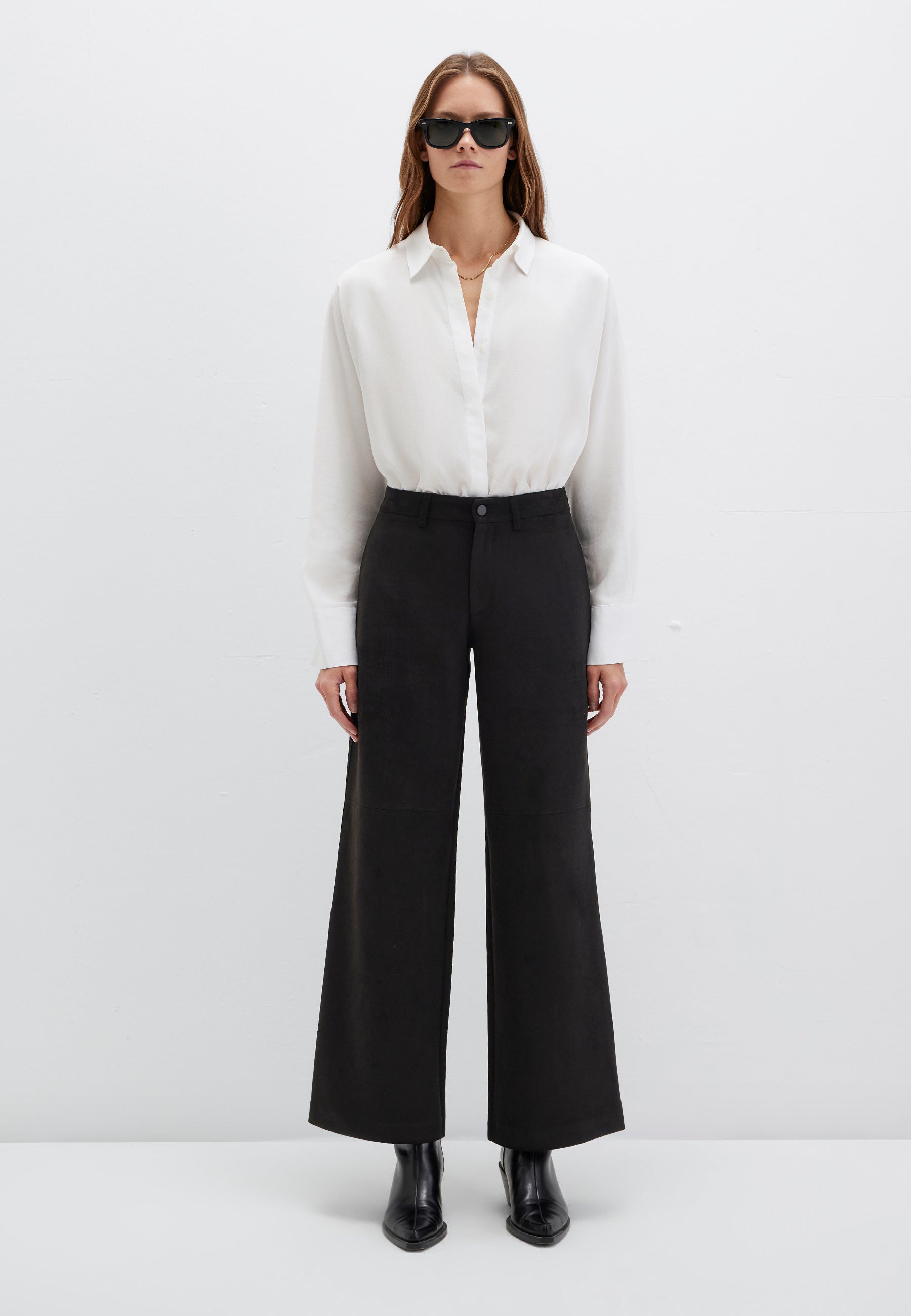 Pantaloni intrecciati in nero Pantaloni Mavi