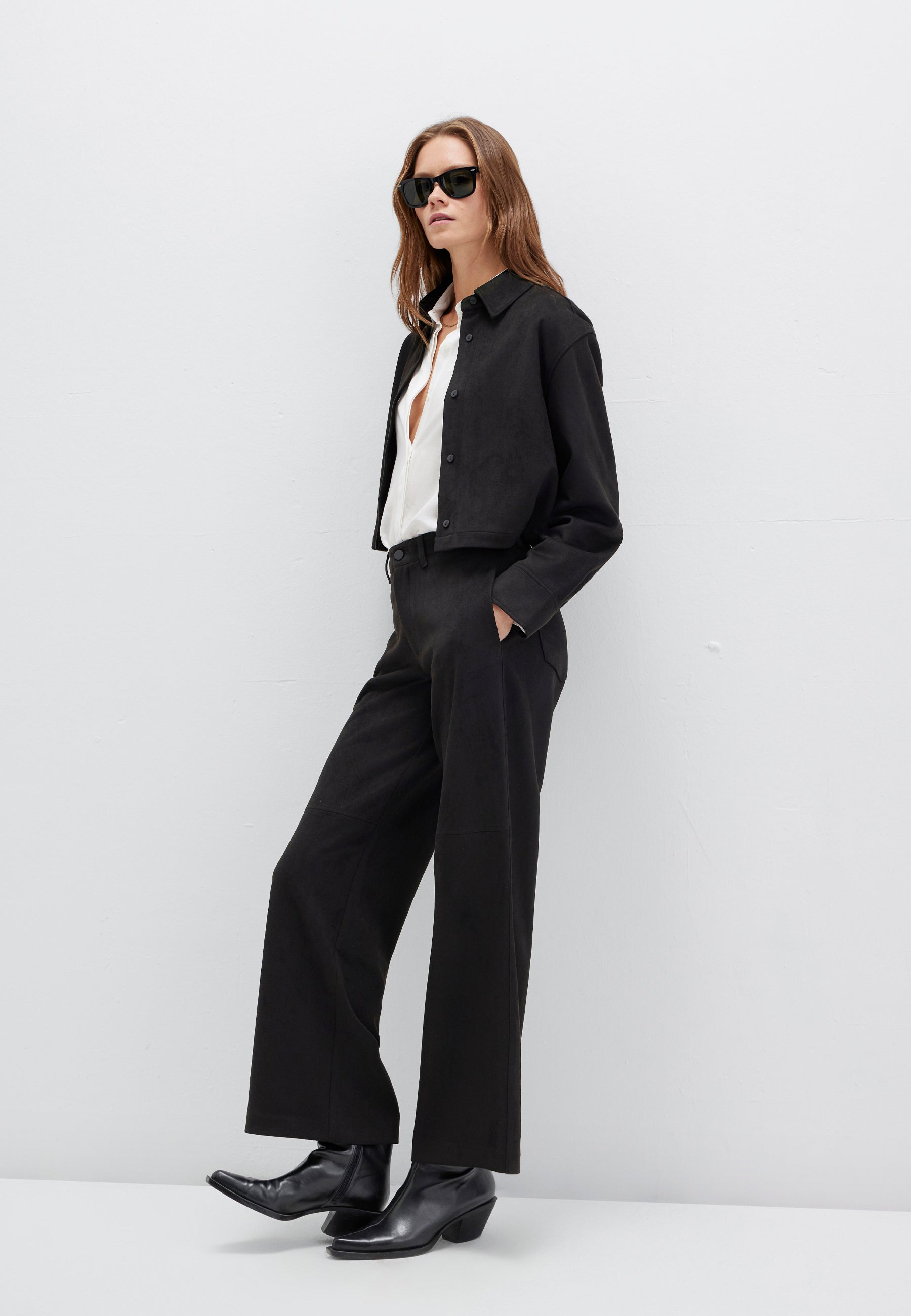 Pantaloni intrecciati in nero Pantaloni Mavi