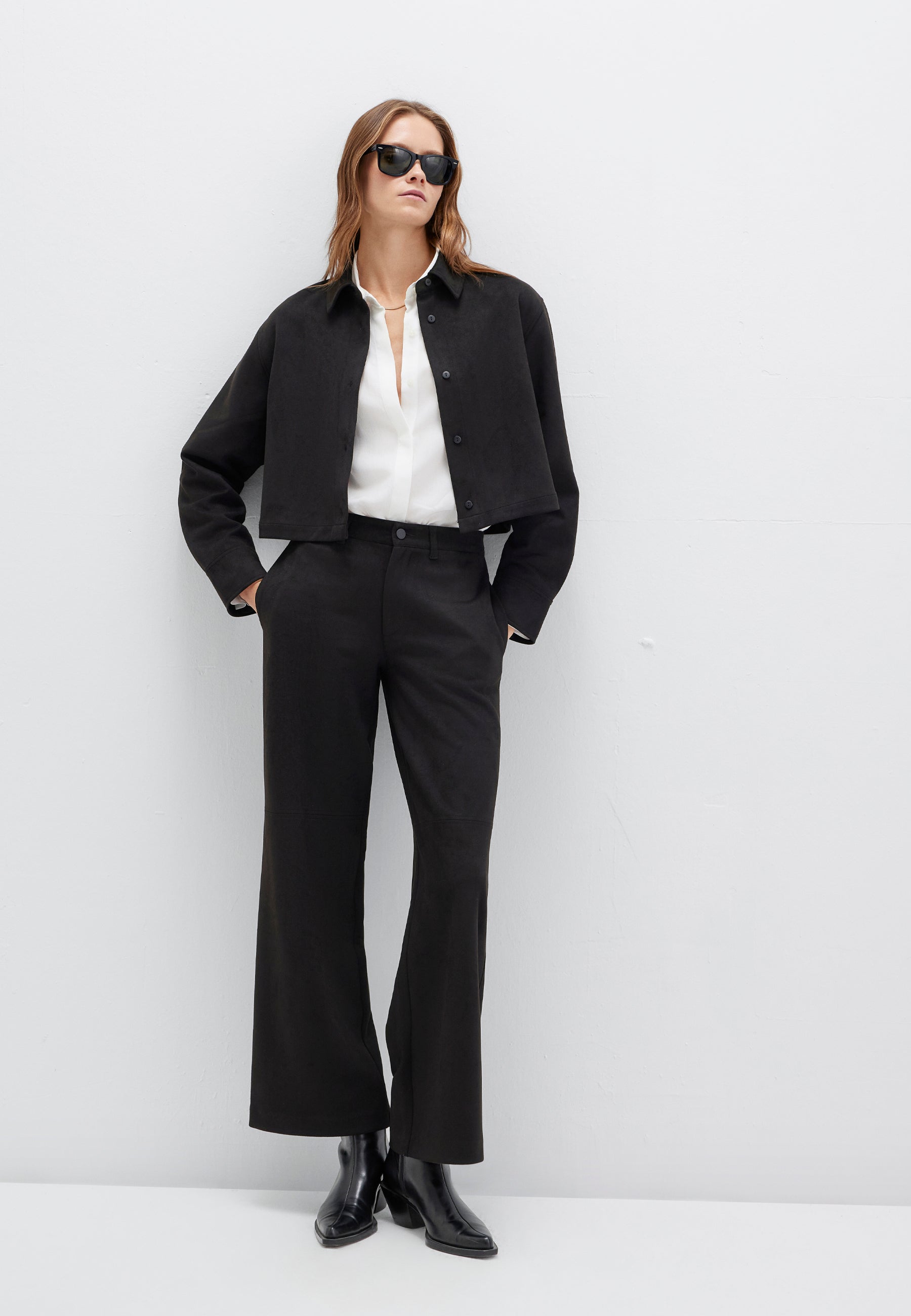 Pantaloni intrecciati in nero Pantaloni Mavi