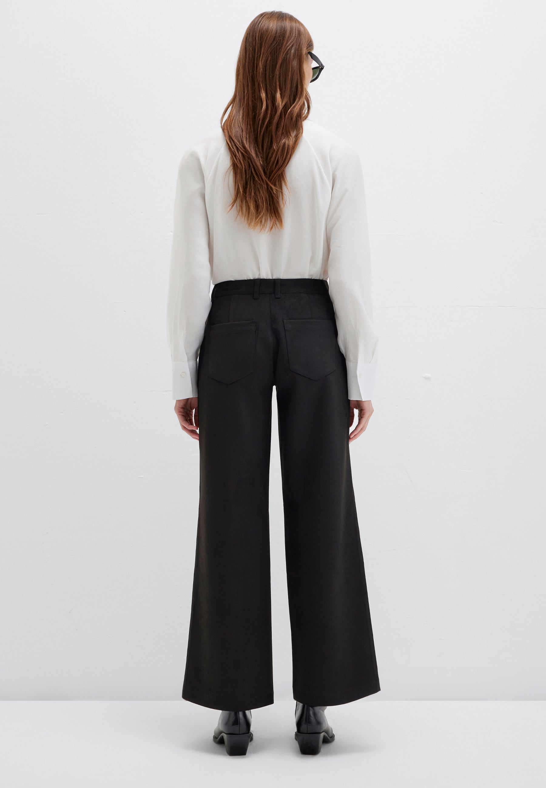 Pantaloni intrecciati in nero Pantaloni Mavi