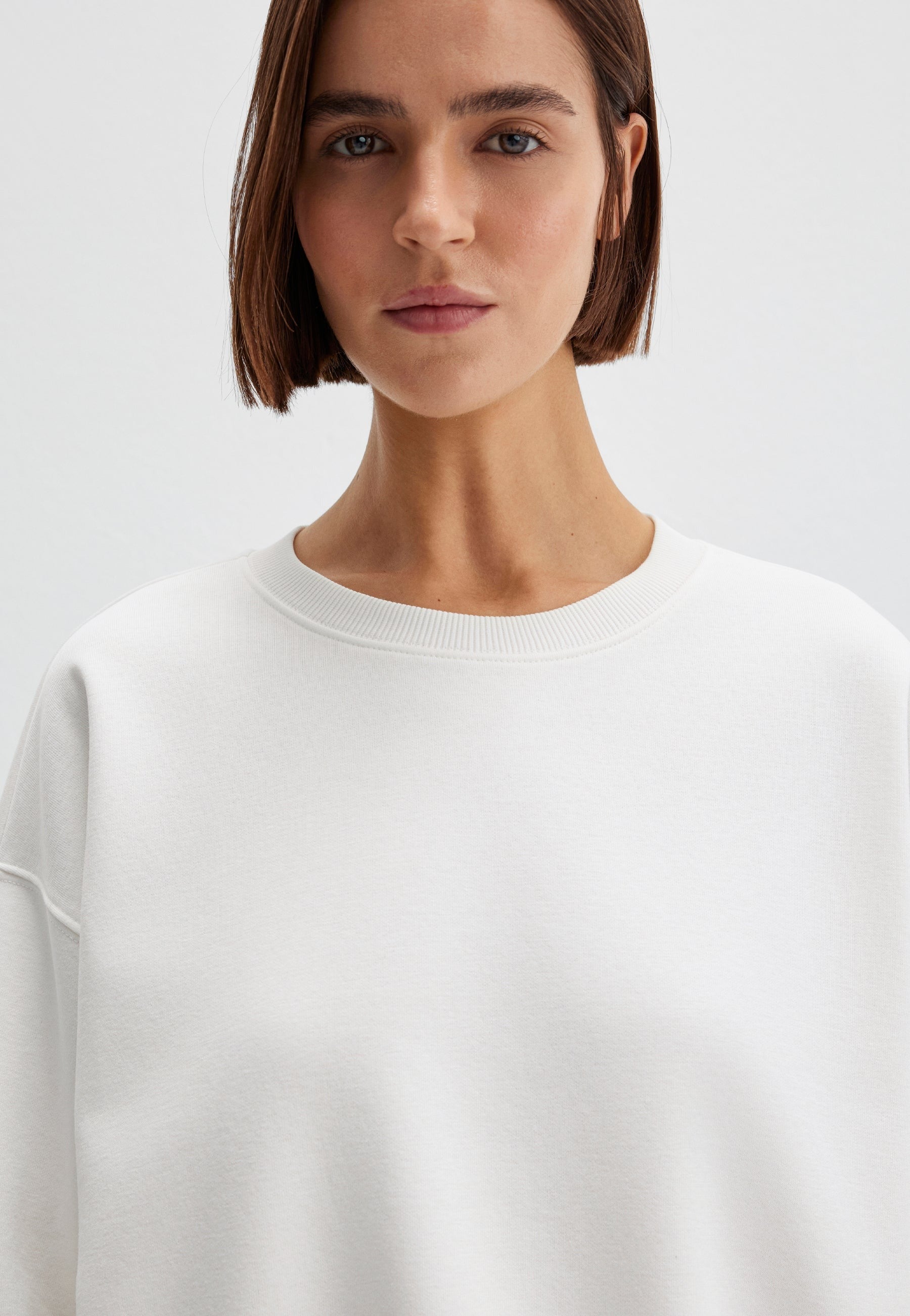 Felpa girocollo in bianco antico