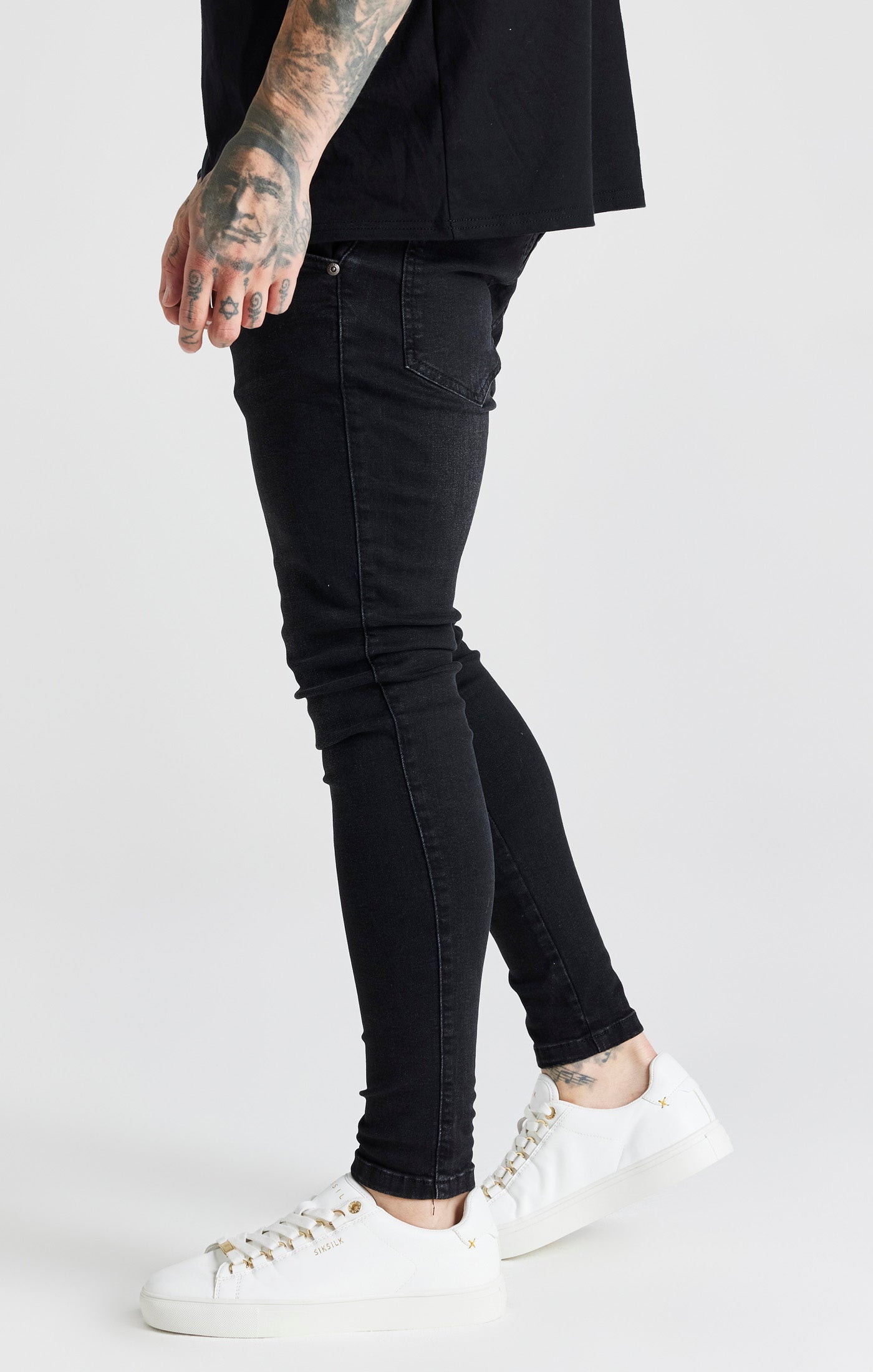 Jeans skinny essenziali in nero SikSilk
