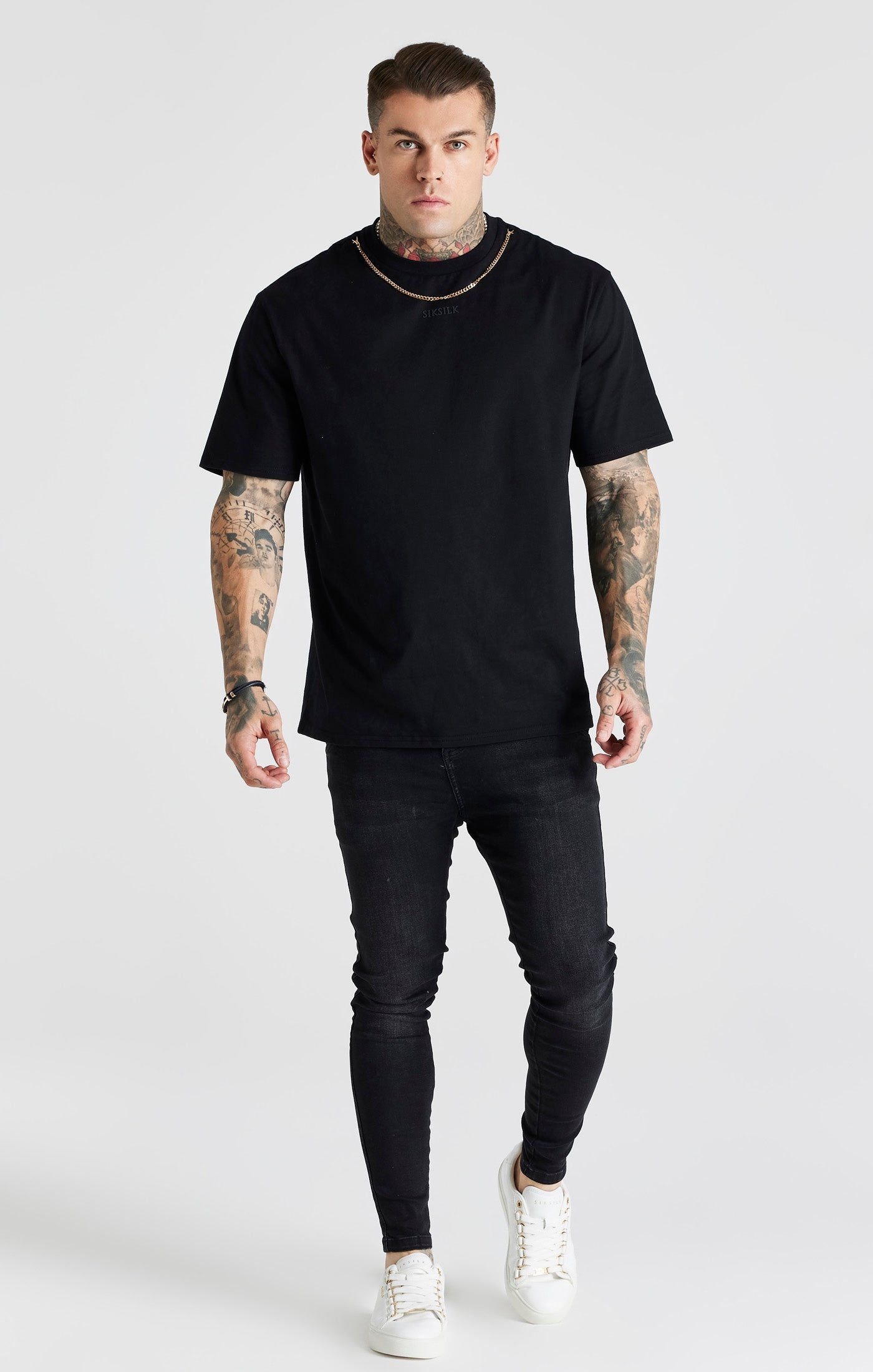 Jeans skinny essenziali in nero SikSilk