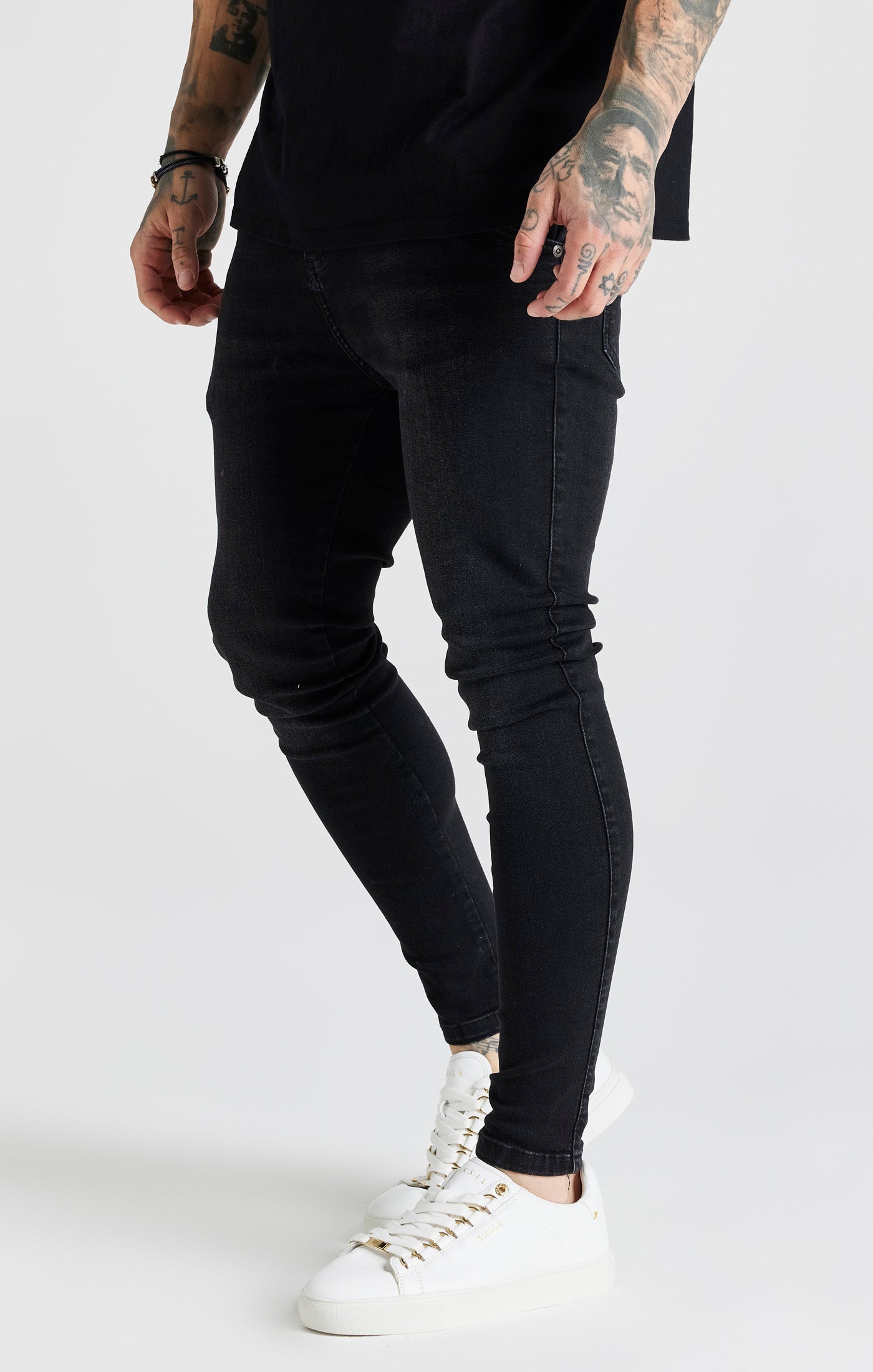 Jeans skinny essenziali in nero SikSilk