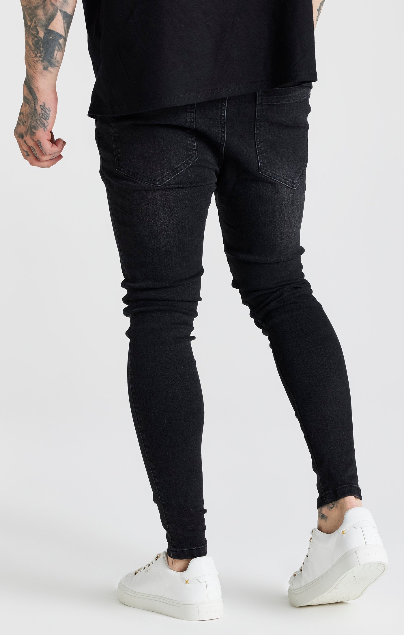 Jeans skinny essenziali in nero SikSilk