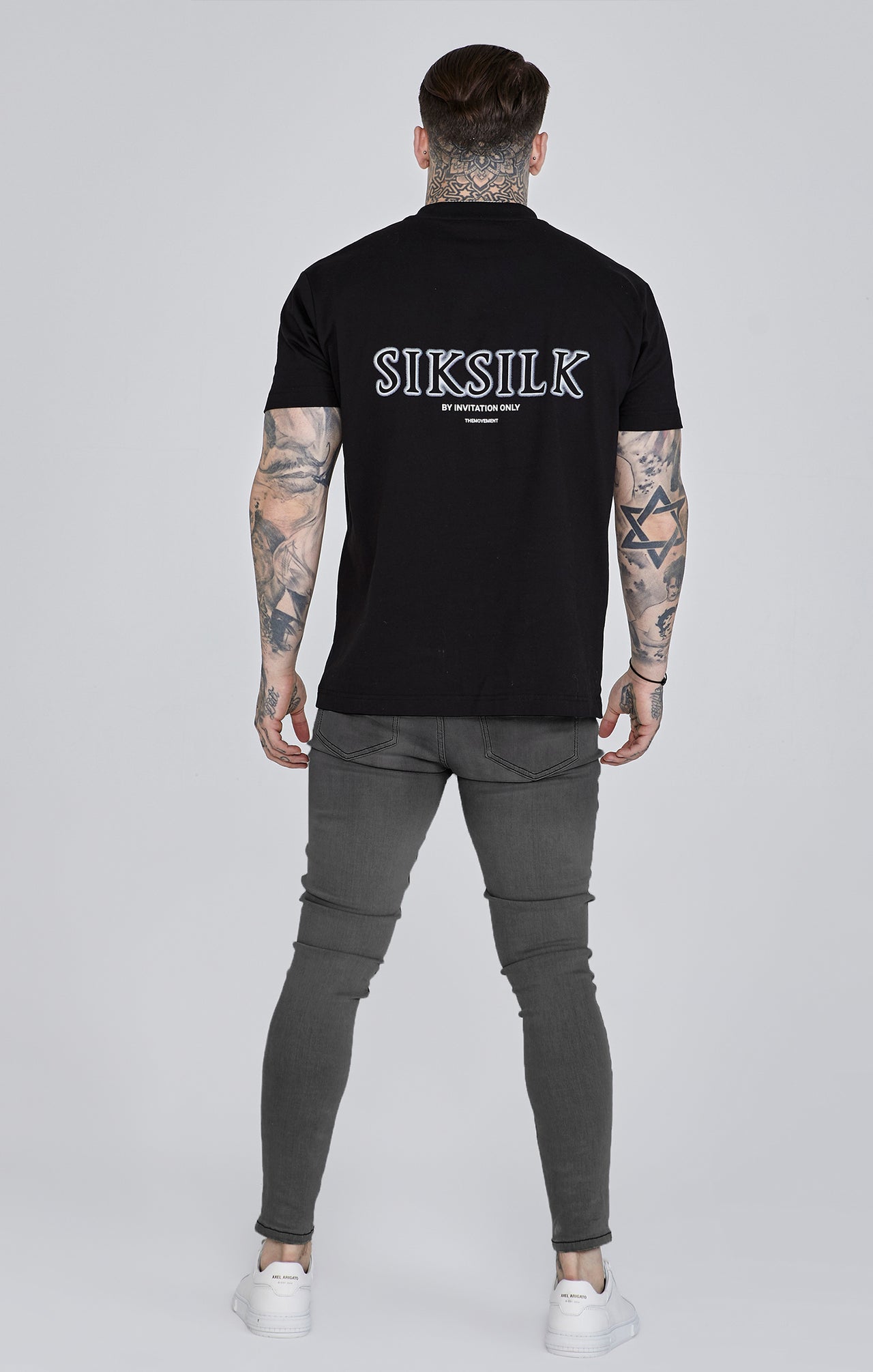 Jeans skinny invecchiati di colore grigio Jeans SikSilk