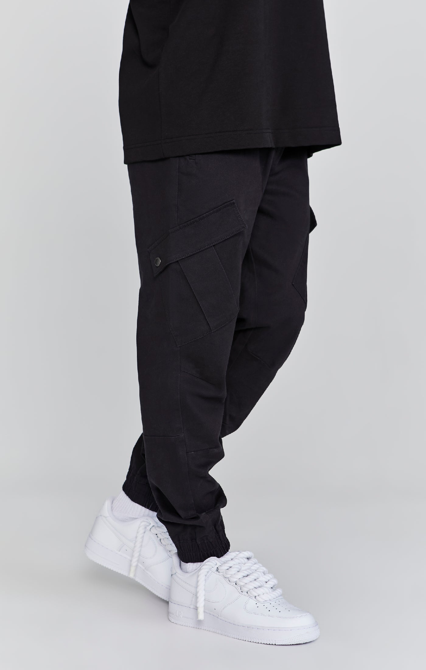 Pantaloni Cargo in nero Pantaloni SikSilk
