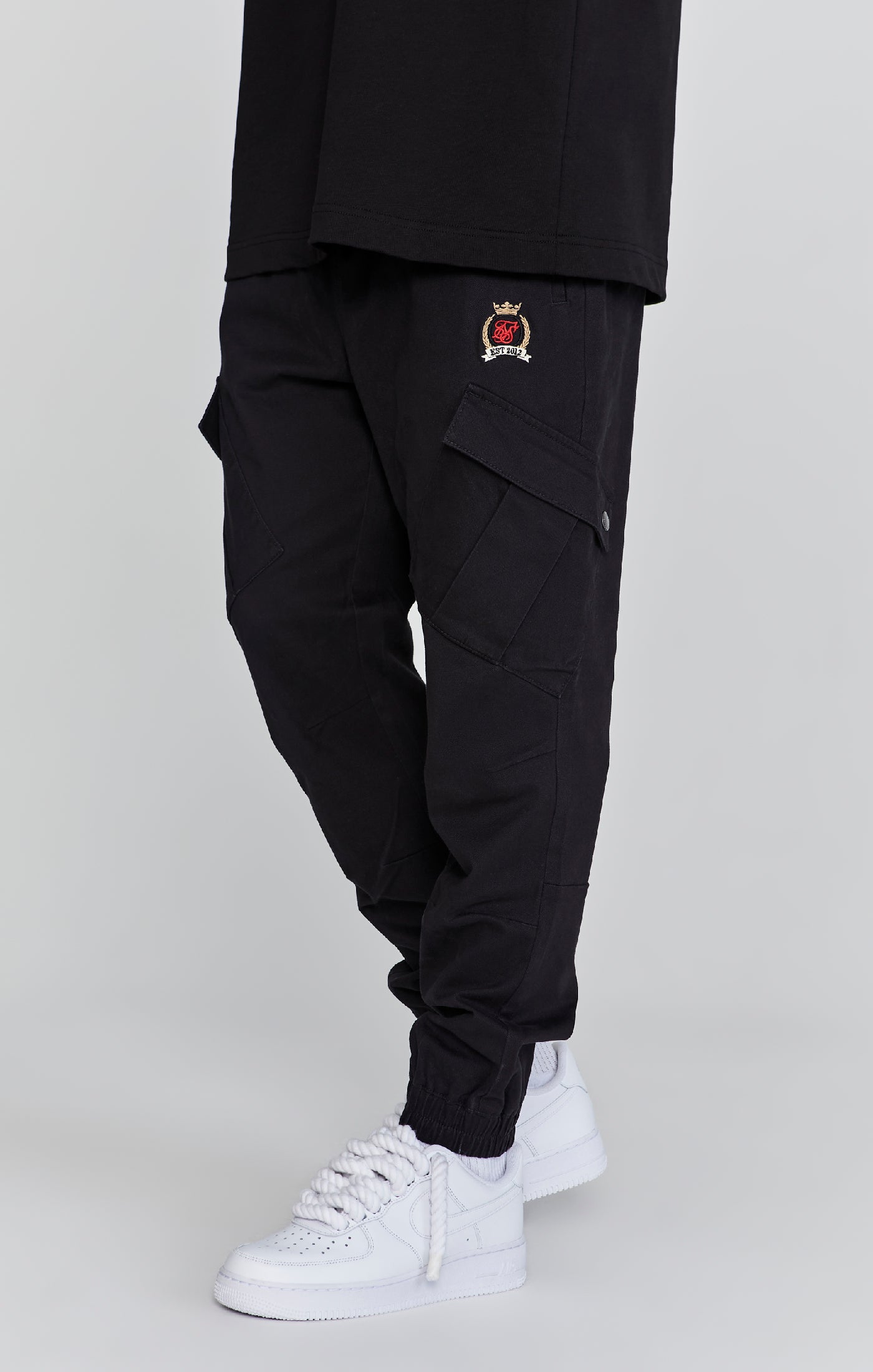 Pantaloni Cargo in nero Pantaloni SikSilk