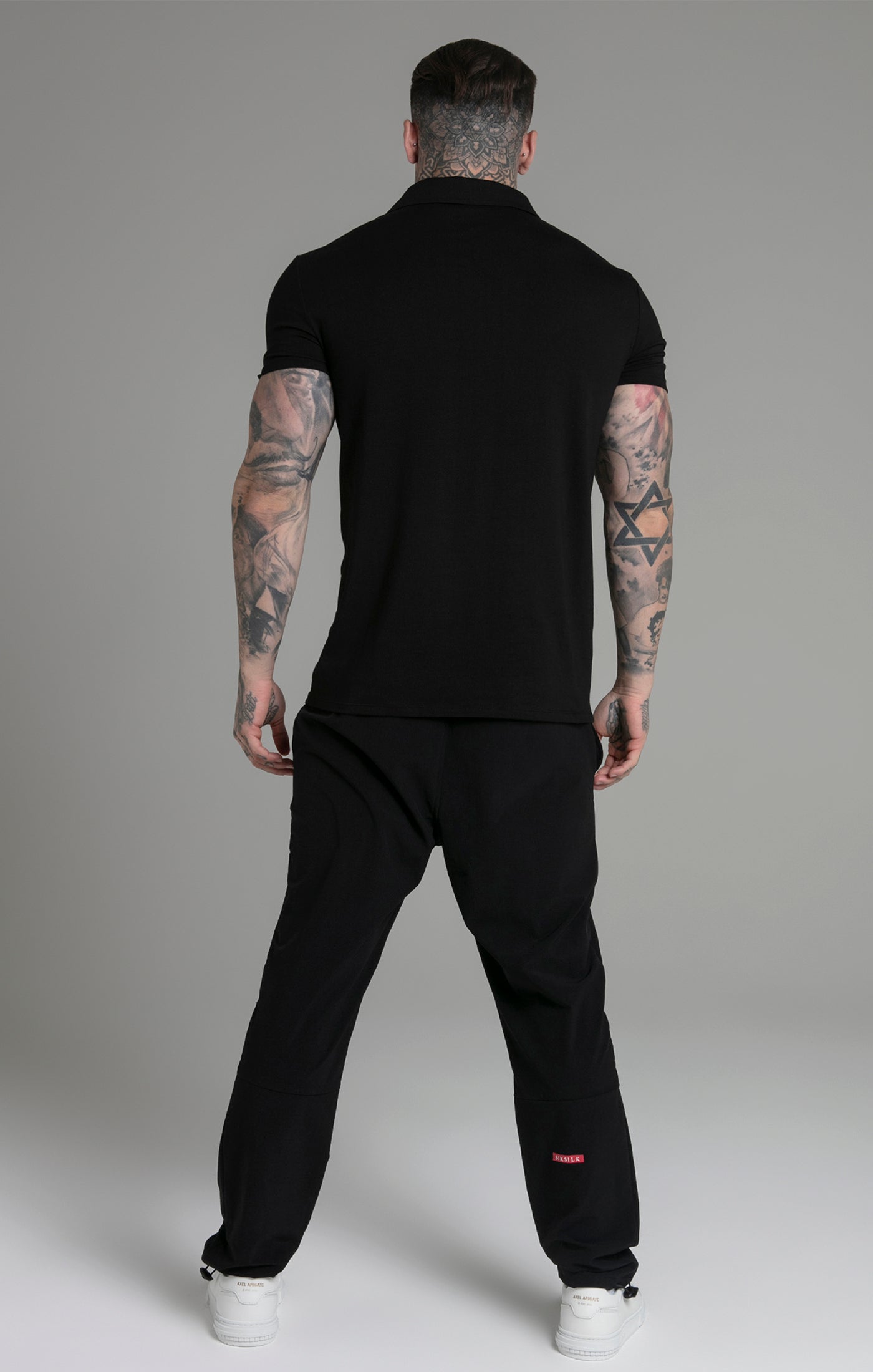 Polo Smart Revere in nero Polo SikSilk
