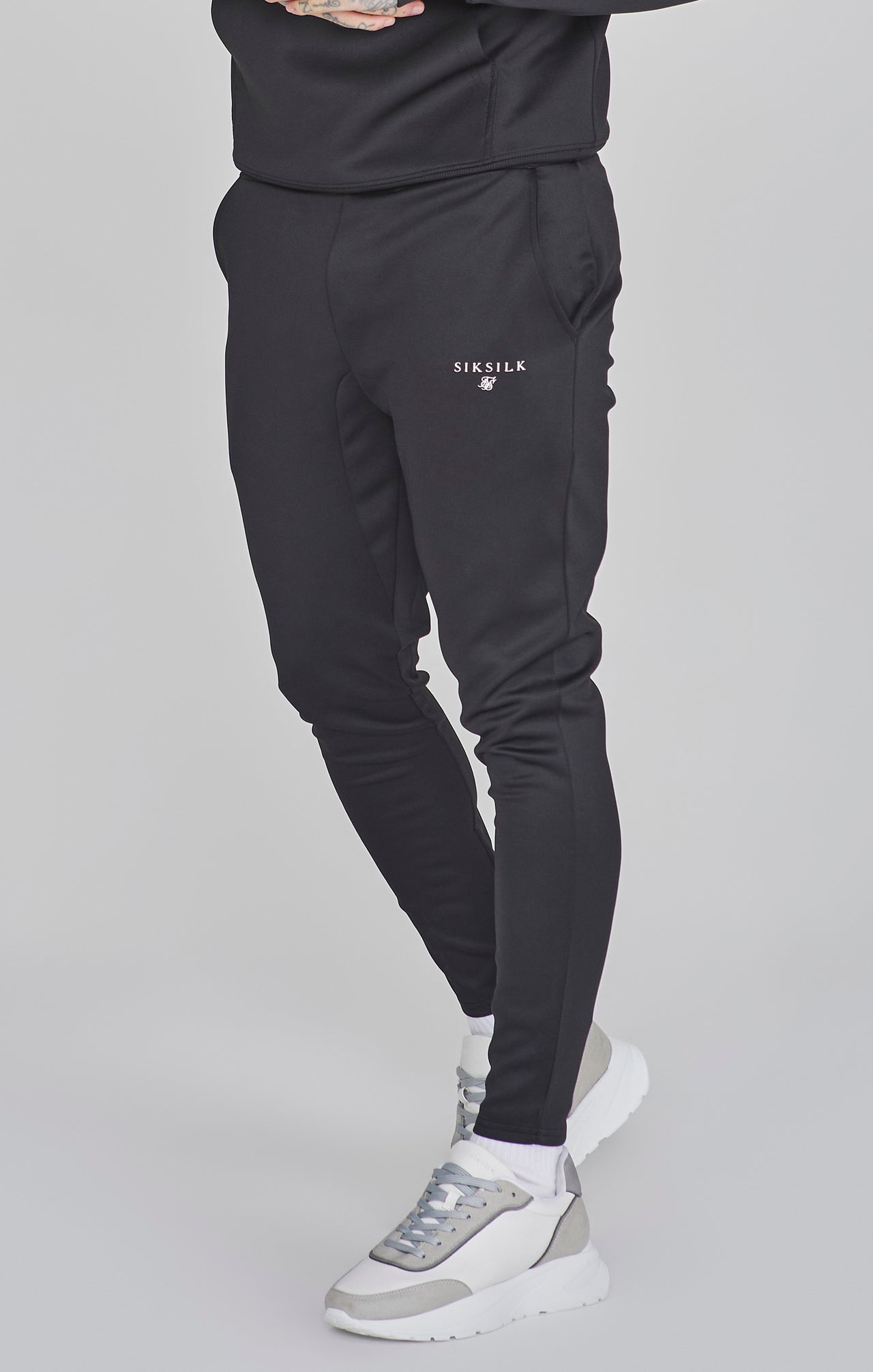 Joggers Essentials in poliestere nero Pantaloni SikSilk