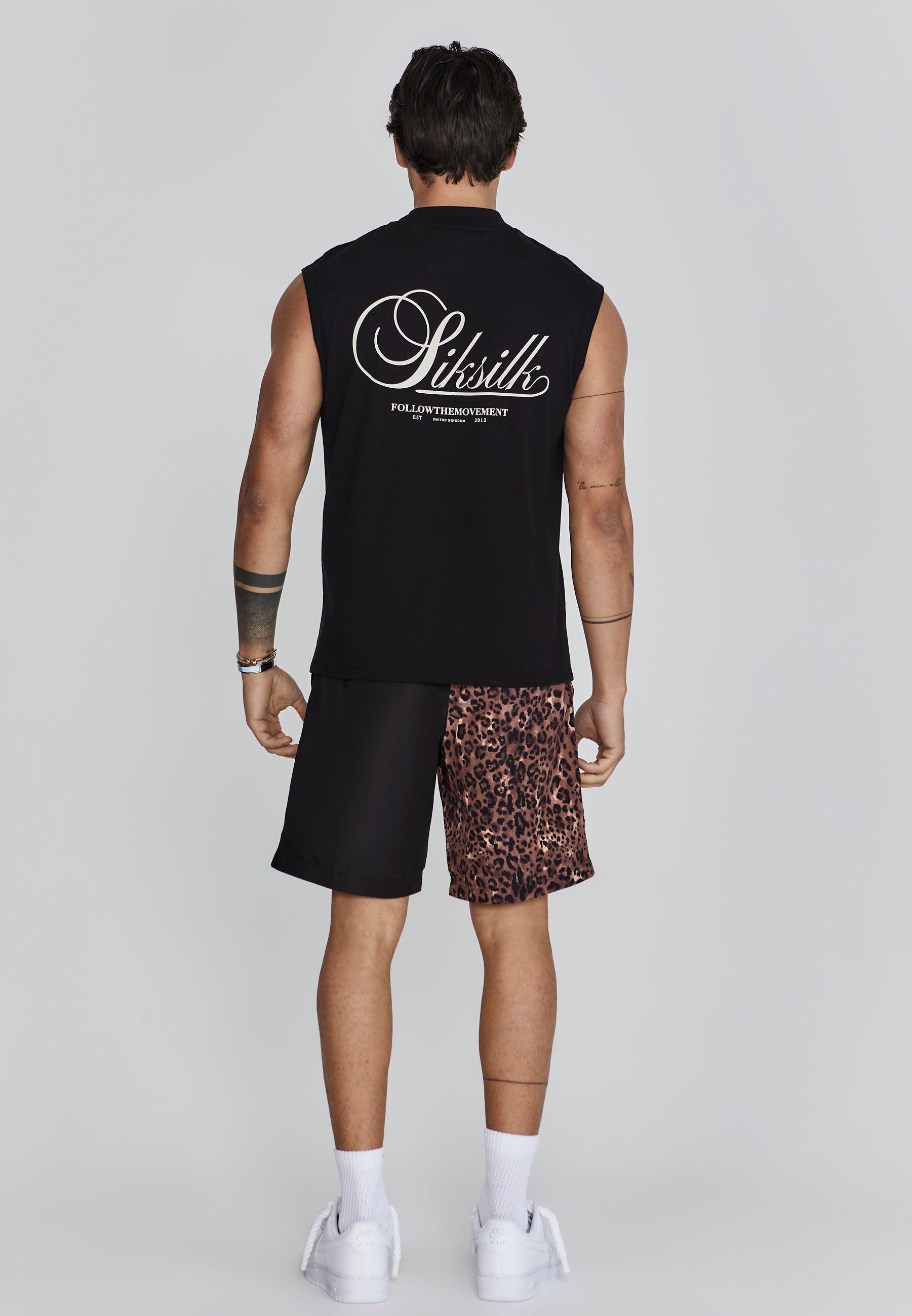 Pantaloncini con stampa animale in nero SikSilk