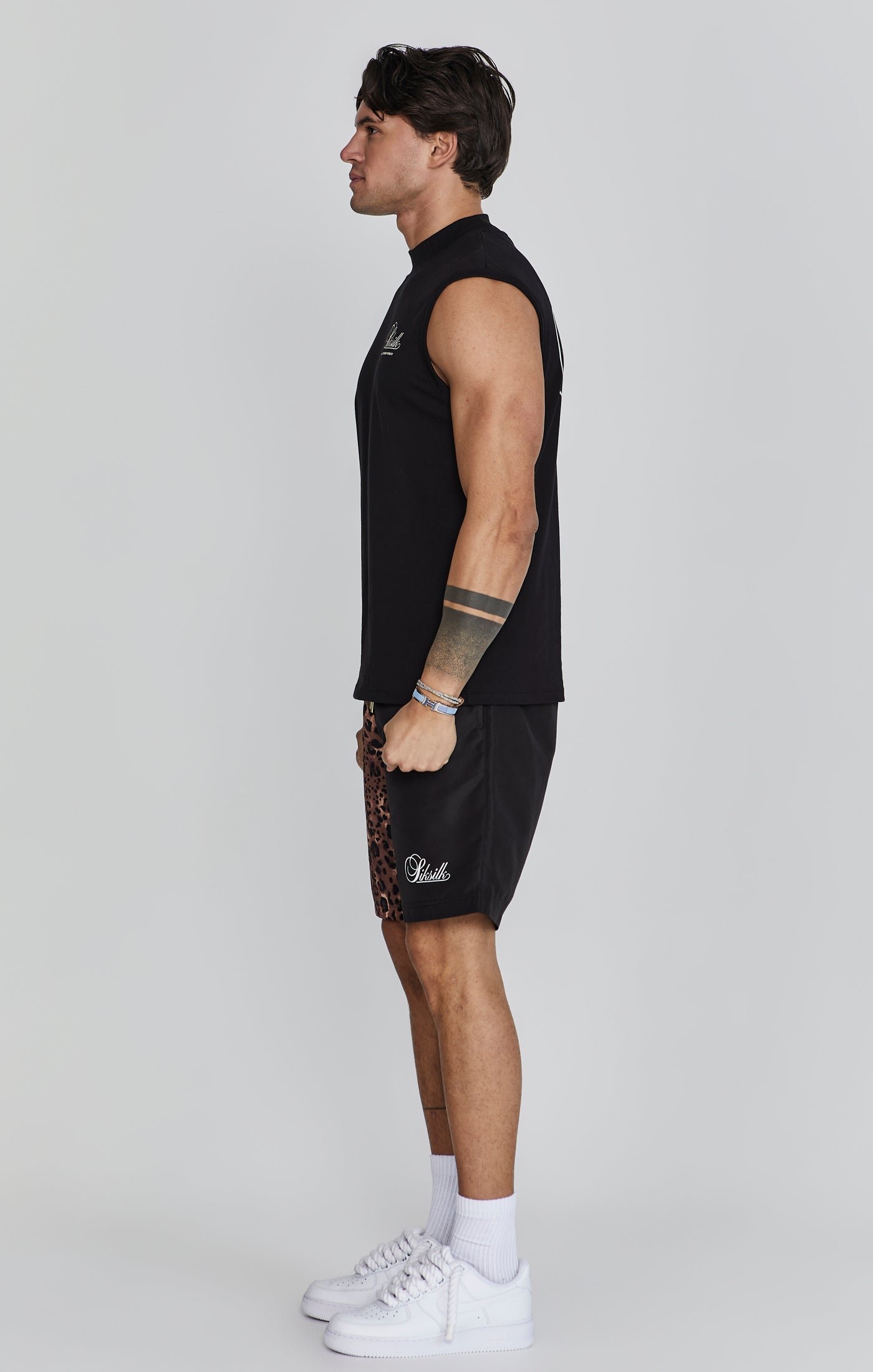 Maglietta senza maniche in nero Top SikSilk