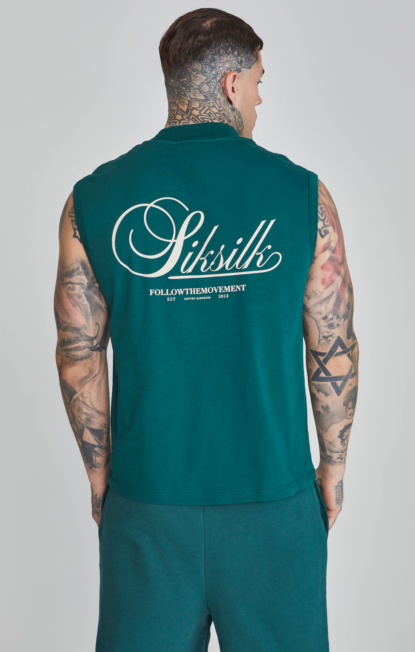 Maglietta senza maniche in verde Magliette SikSilk