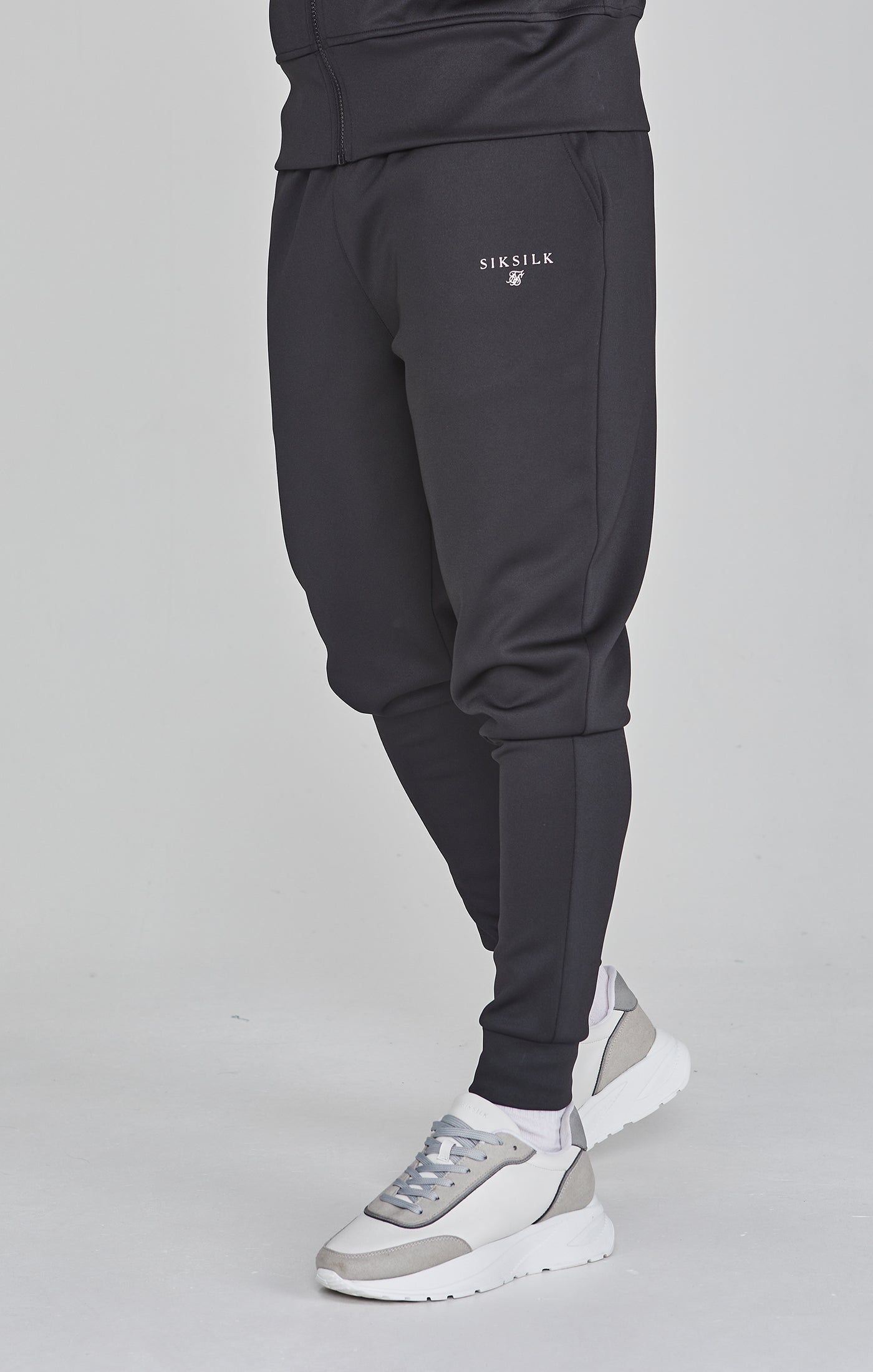 Pantaloni da corsa Essentials in polietilene nero Pantaloni SikSilk