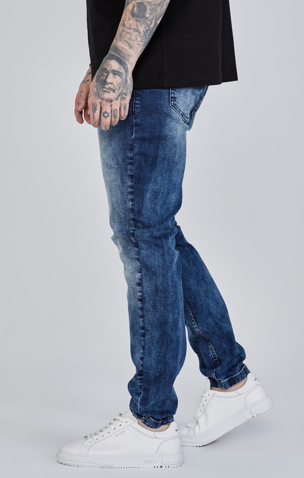 Jeans slim fit invecchiati in blu SikSilk
