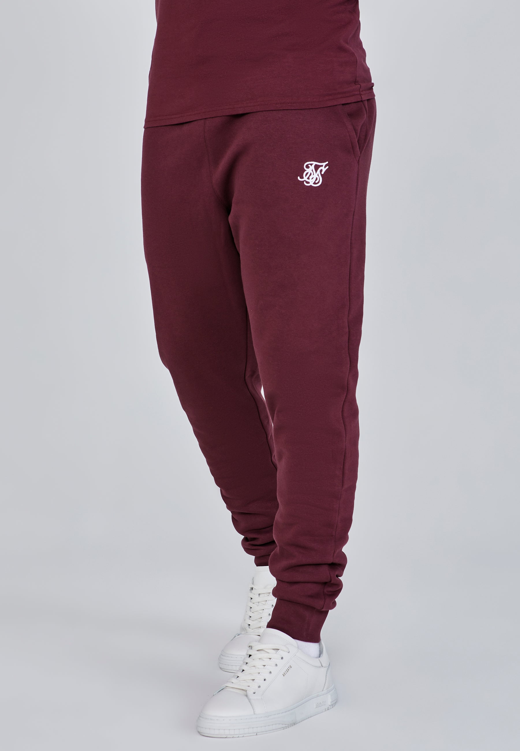 Joggers essenziali in pantaloni bordeaux SikSilk
