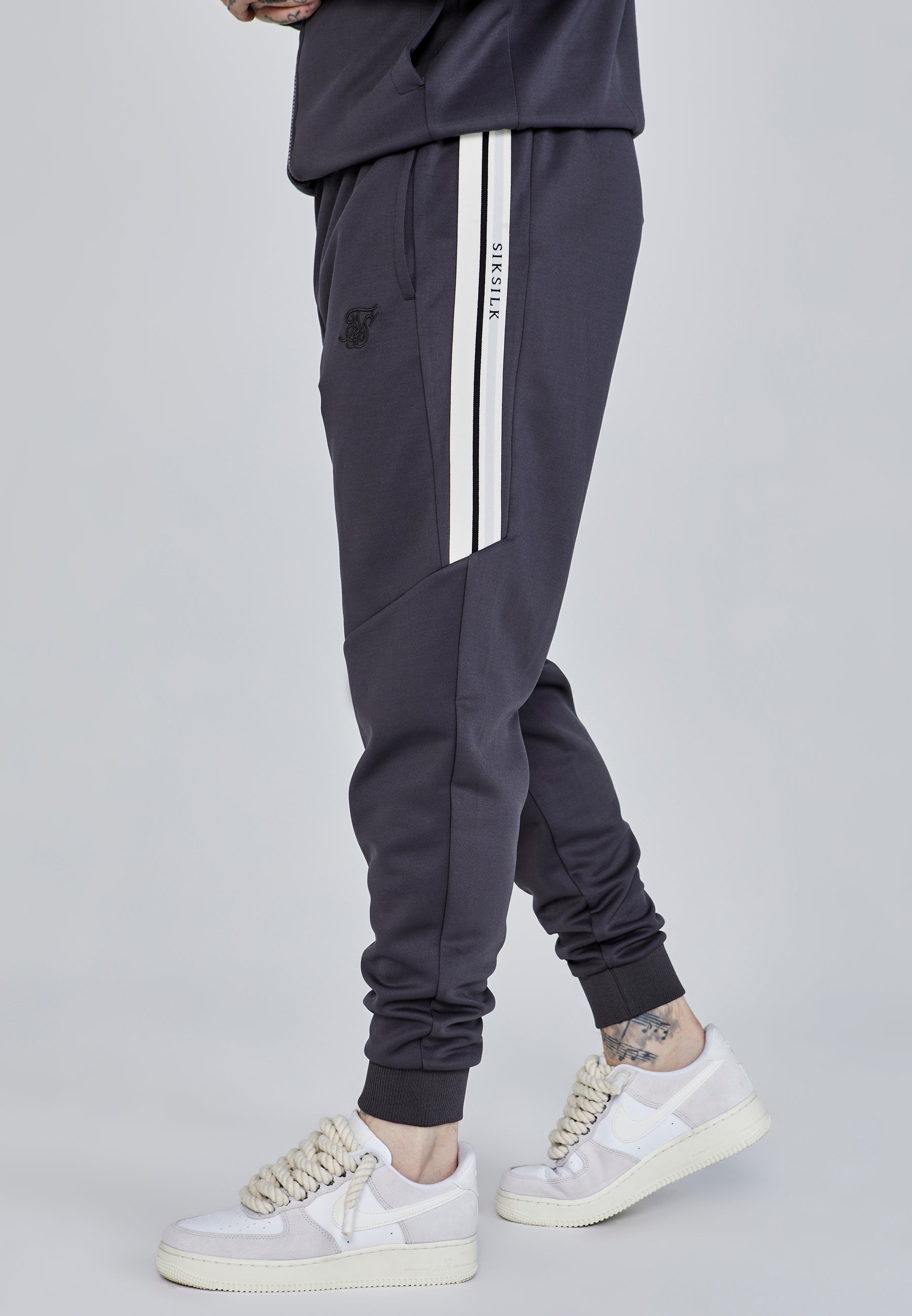 Joggers dal taglio rilassato in pantaloni grigi SikSilk