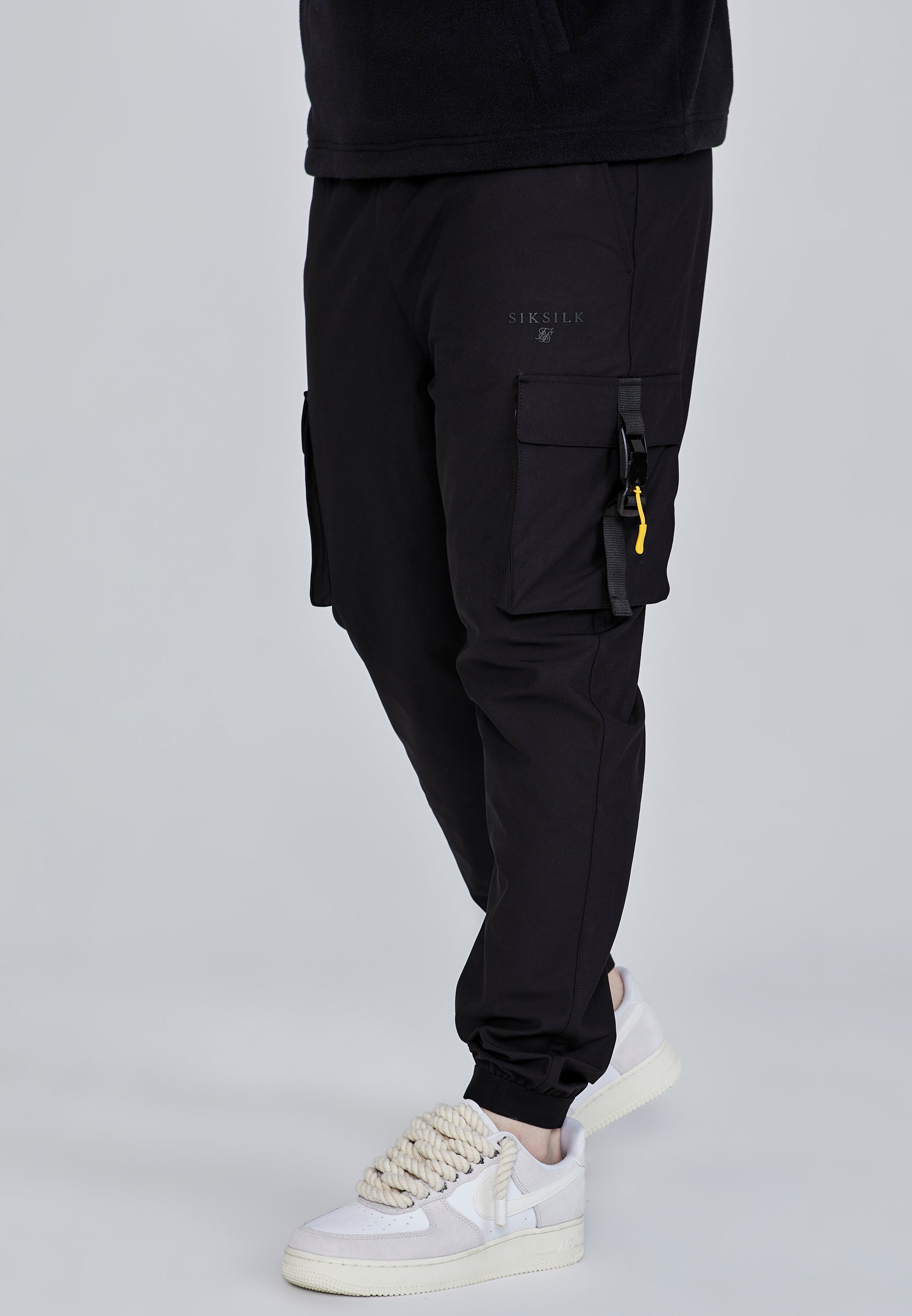 Pantaloni Cargo in nero Pantaloni SikSilk