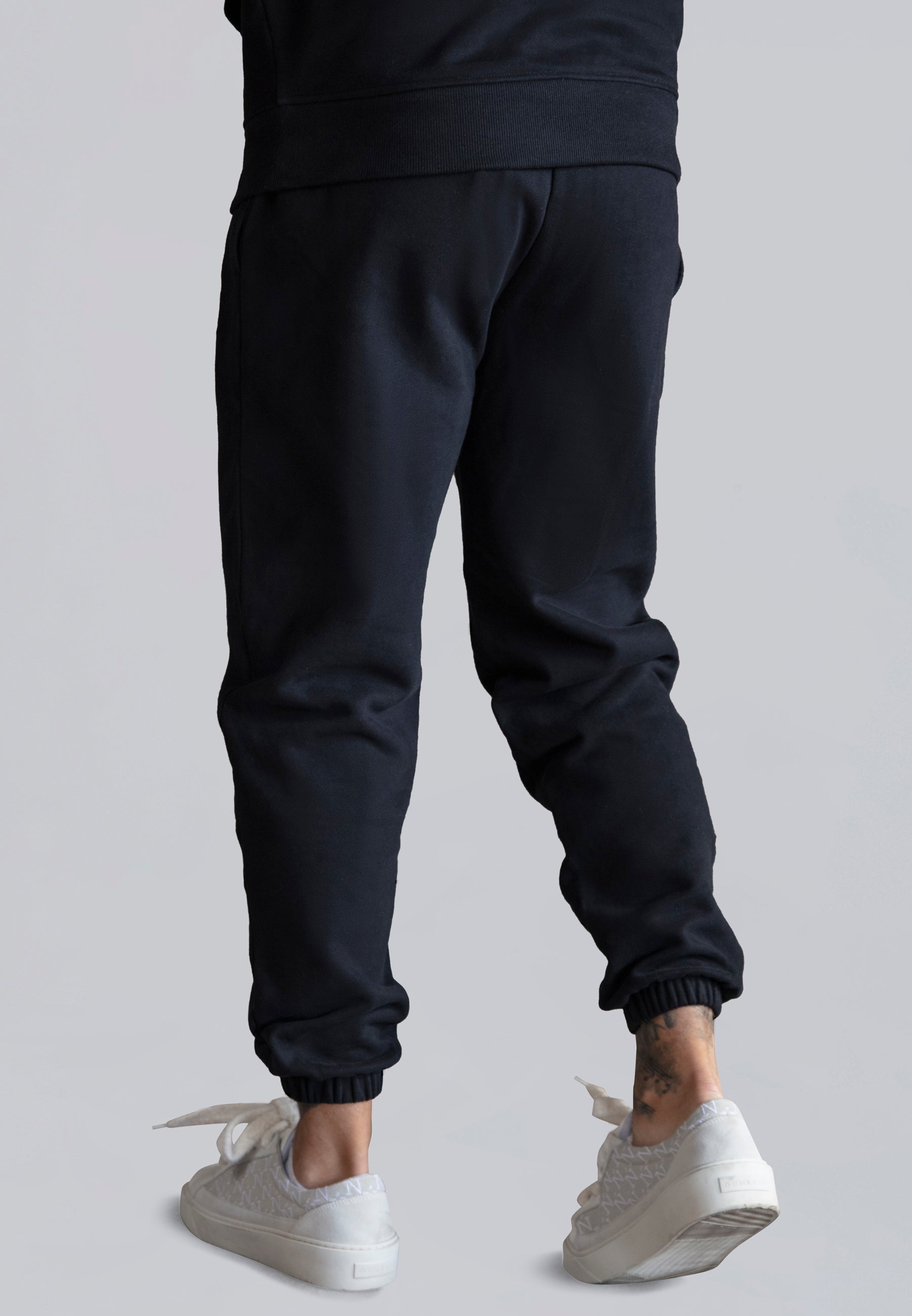 Joggers dal taglio rilassato in pantaloni neri SikSilk