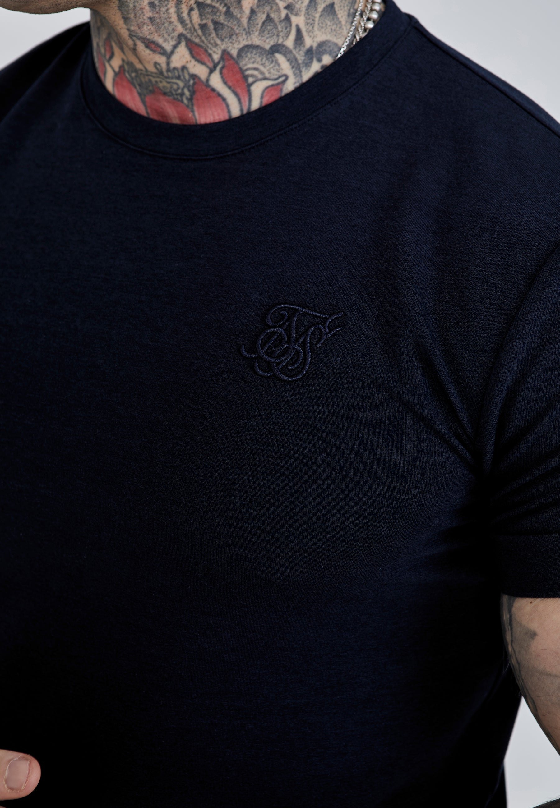 Maglietta con manica arrotolata in blu T-shirt SikSilk