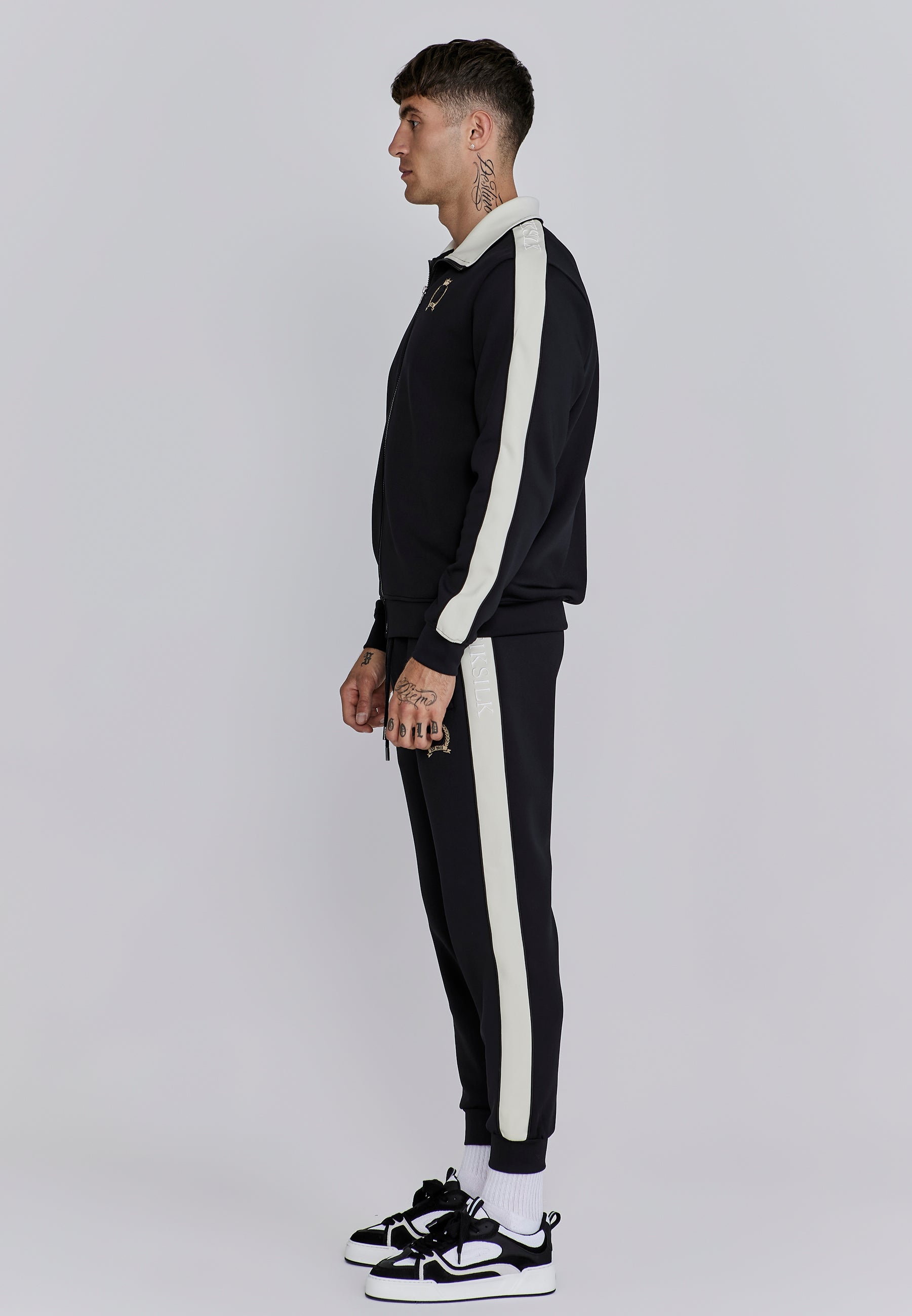 Crest Track Top in nero Giacche da ginnastica SikSilk
