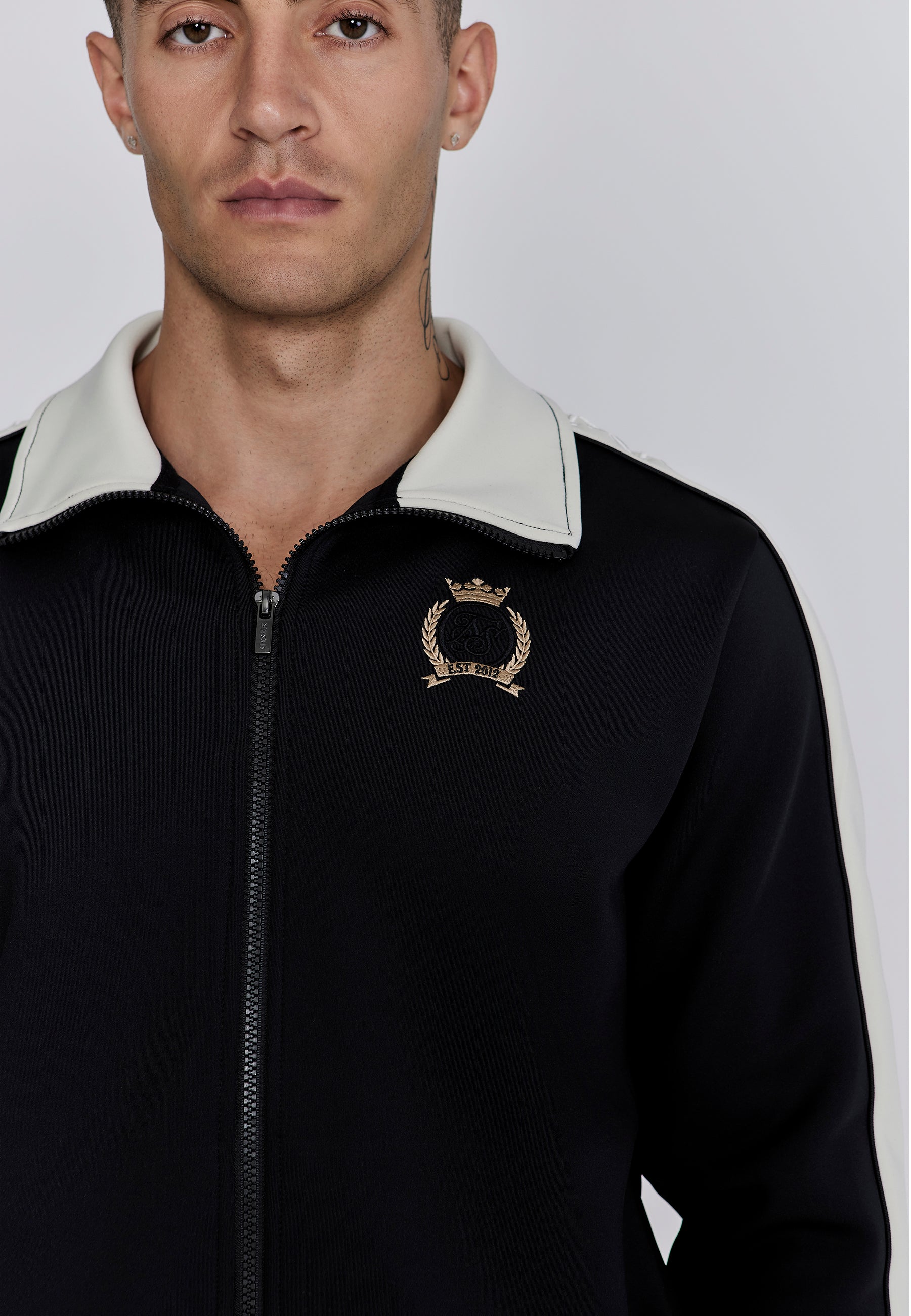Crest Track Top in nero Giacche da ginnastica SikSilk