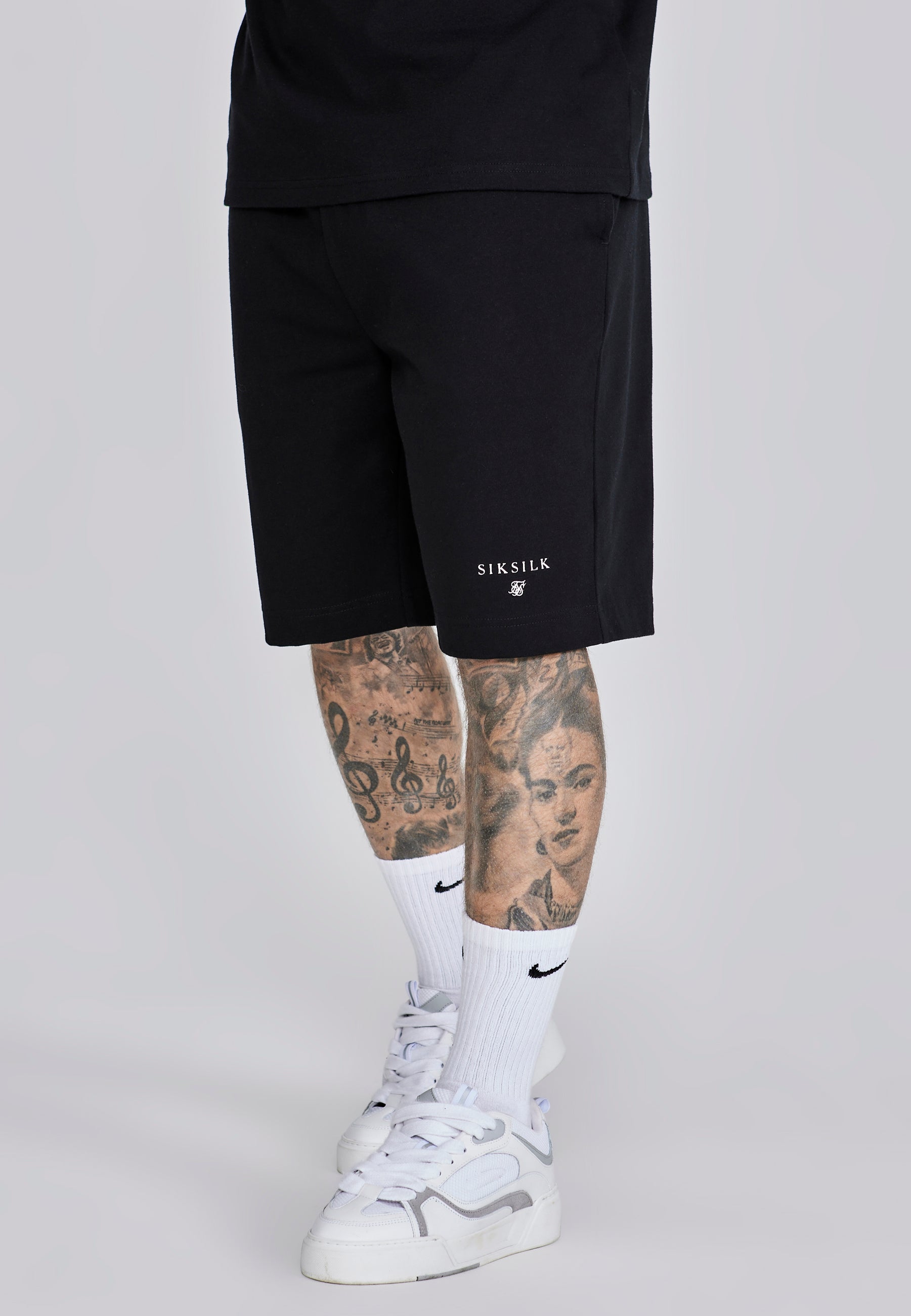 Set di maglietta e pantaloncini neri SikSilk