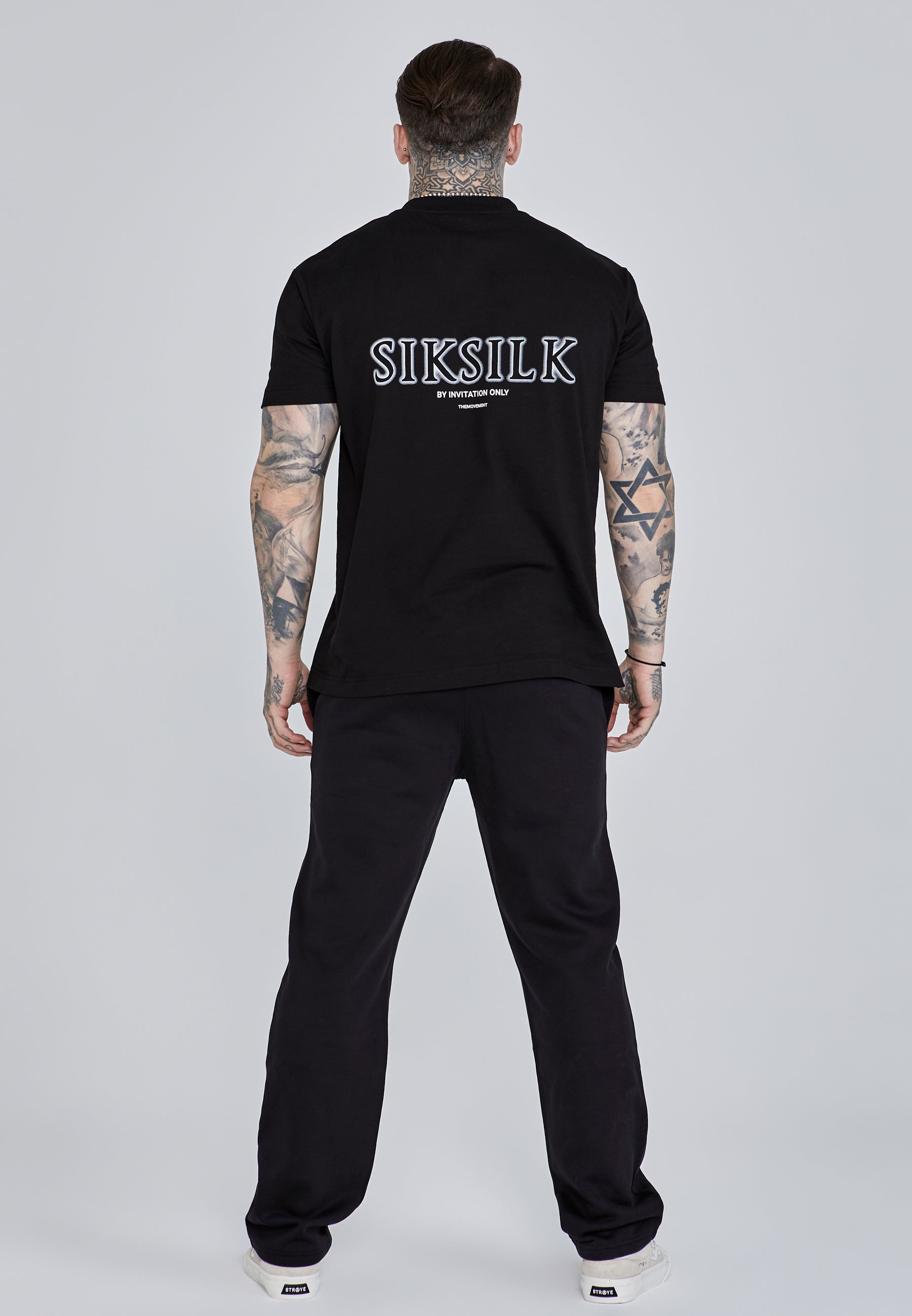 Pantaloni da corsa in nero Pantaloni SikSilk