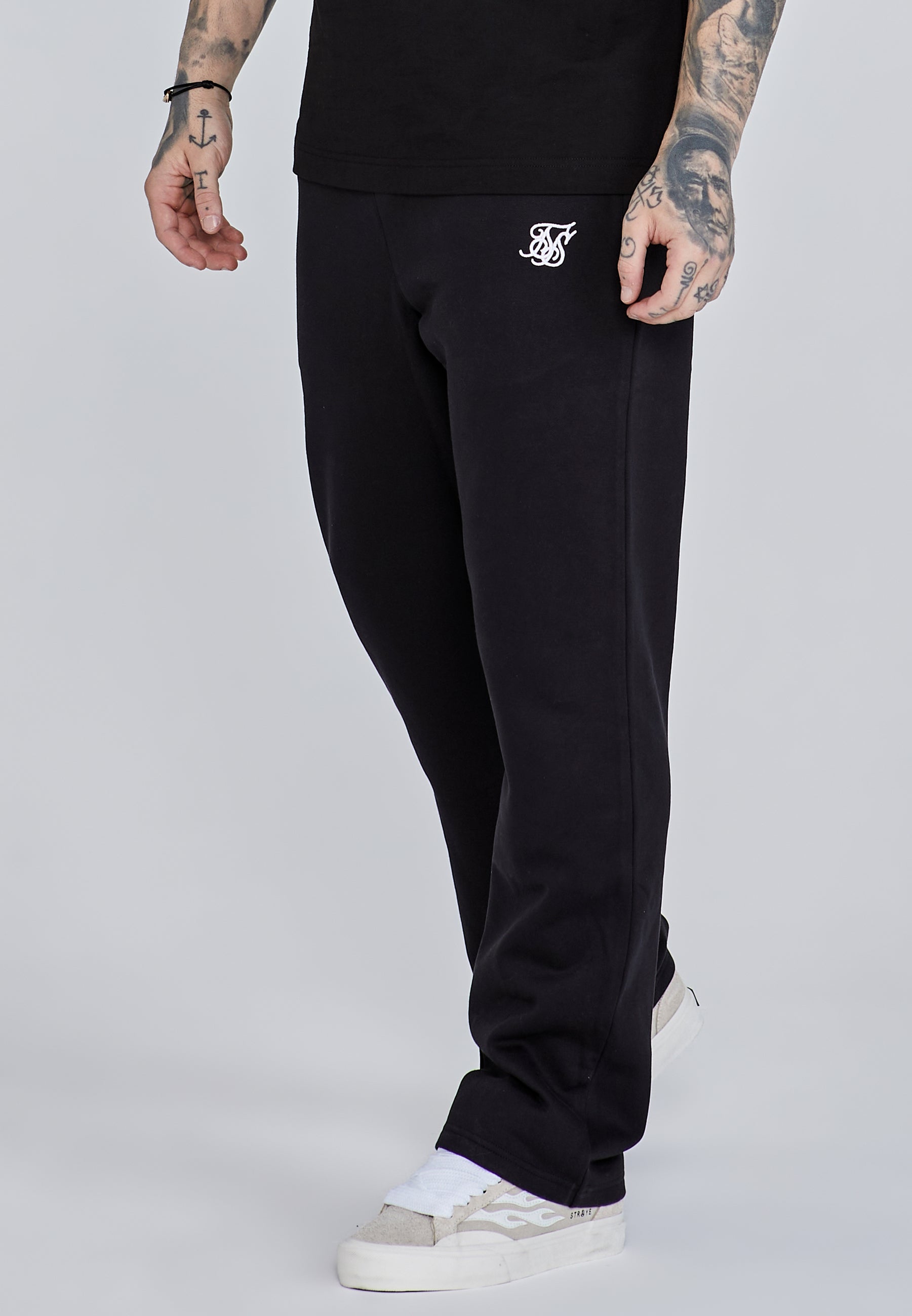 Pantaloni da corsa in nero Pantaloni SikSilk