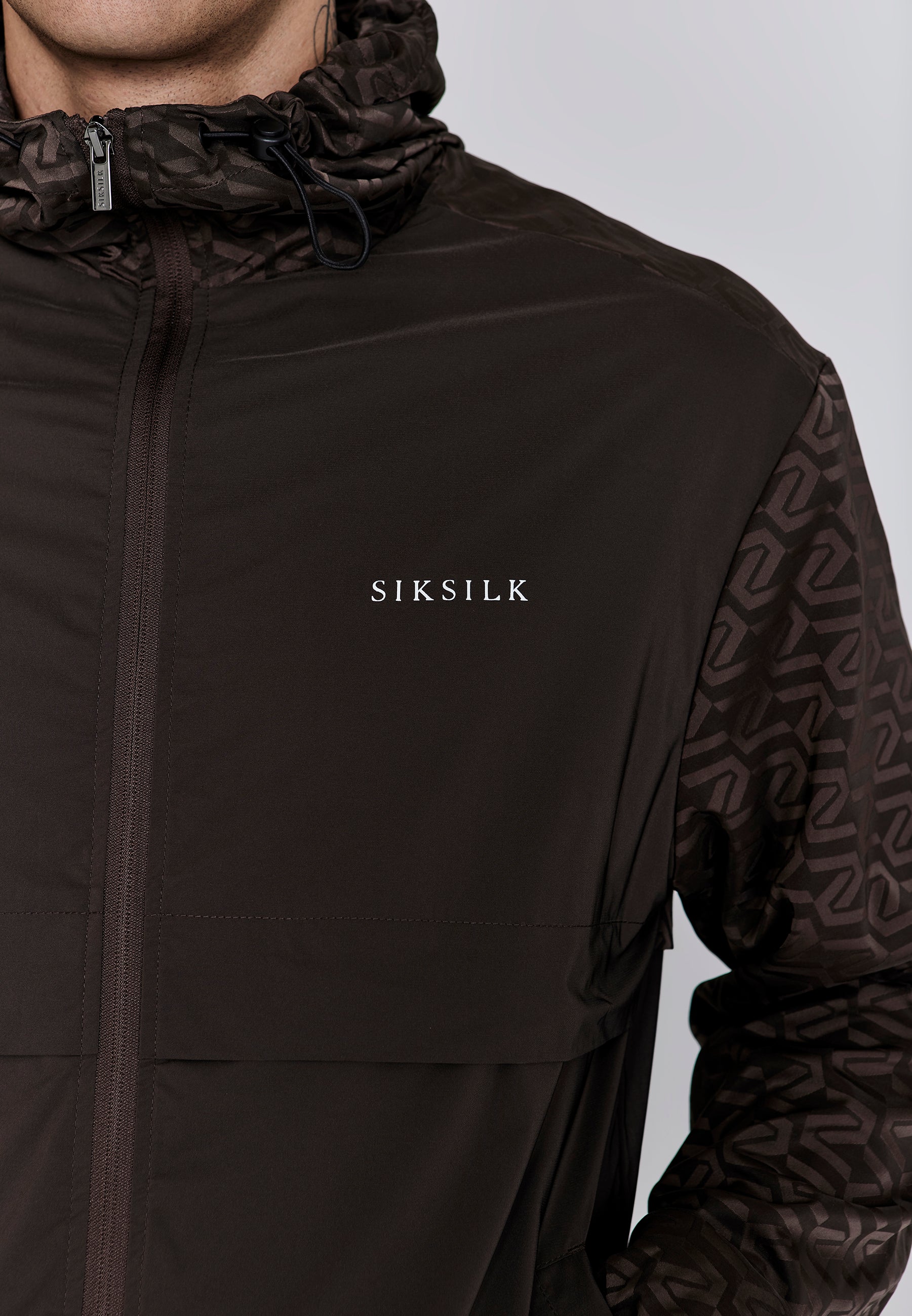 Giacca a vento Aop in marrone Giacche SikSilk