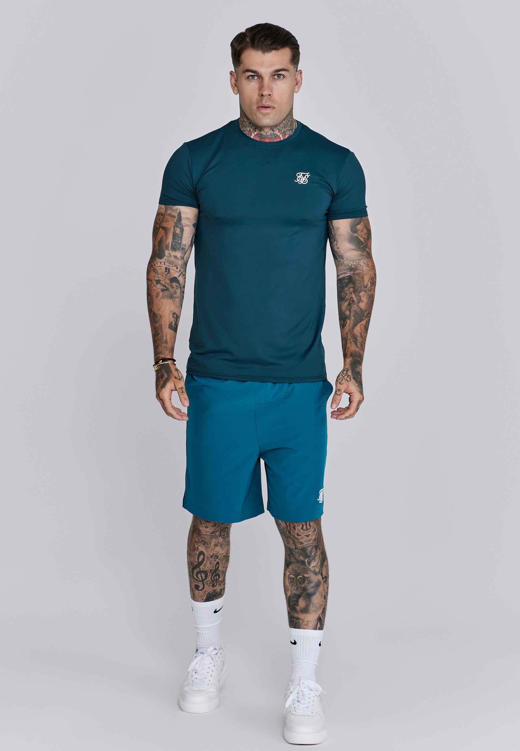 Maglietta Muscle Fit in verde Magliette SikSilk