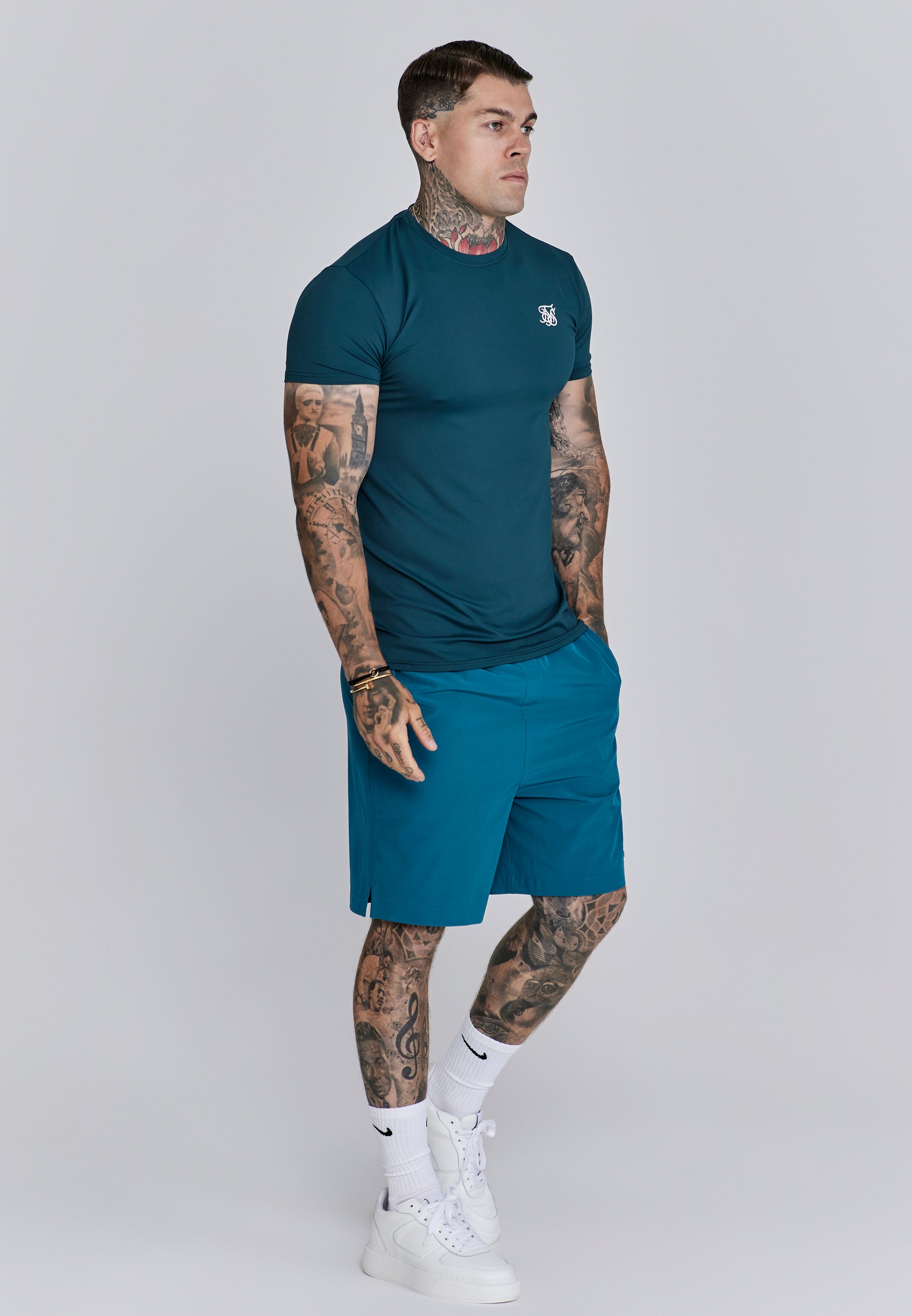 Maglietta Muscle Fit in verde Magliette SikSilk