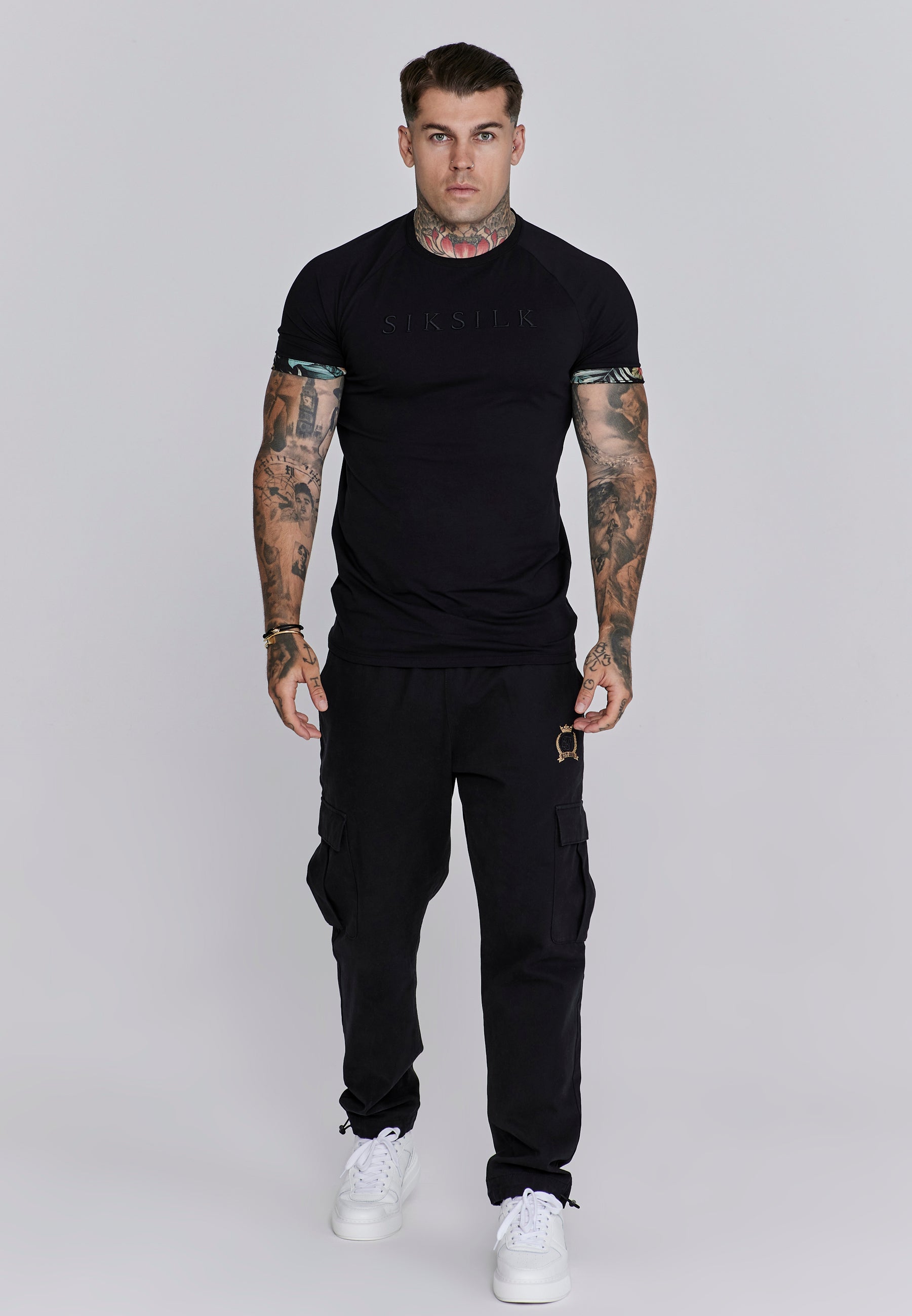 Maglietta con maniche a rotolo in nero Magliette SikSilk