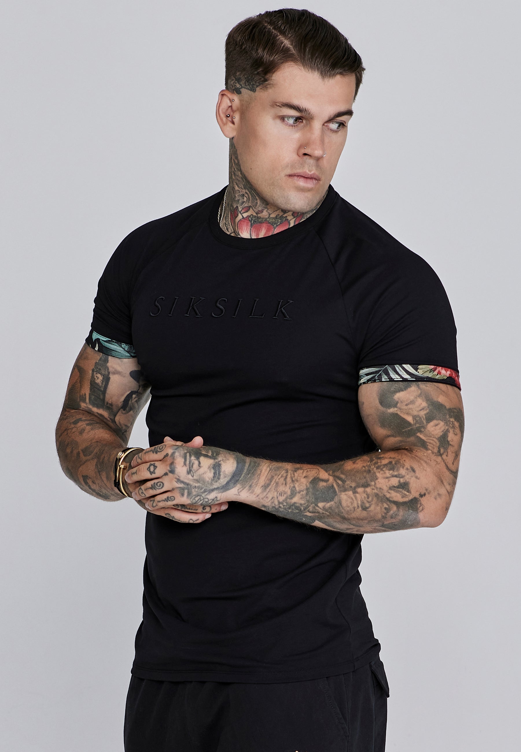 Maglietta con maniche a rotolo in nero Magliette SikSilk