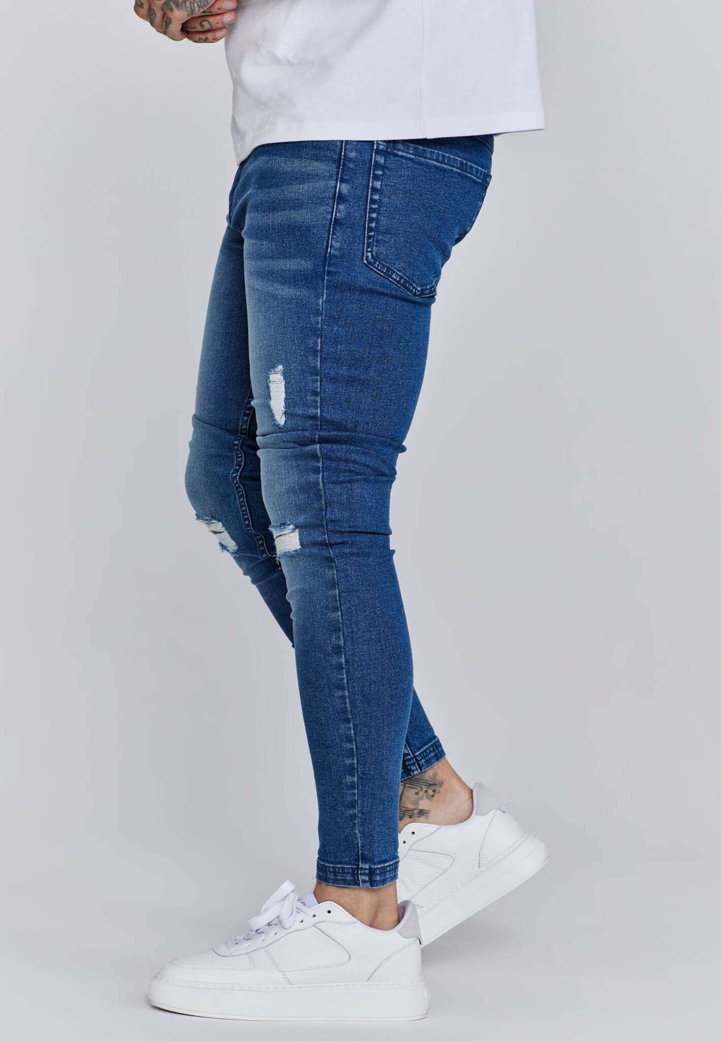Jeans skinny invecchiati in jeans blu SikSilk