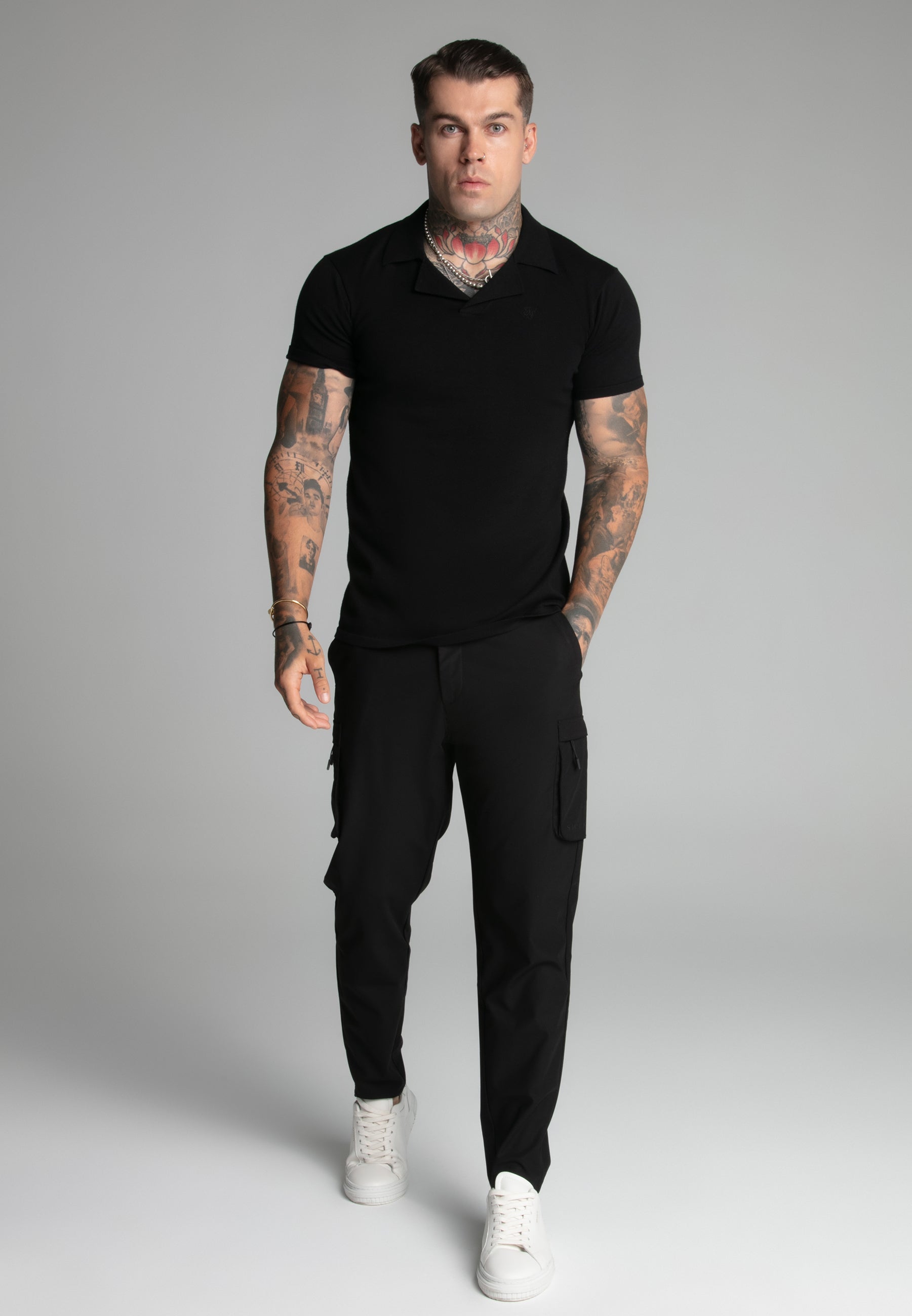 Polo con colletto Revere in nero Magliette SikSilk