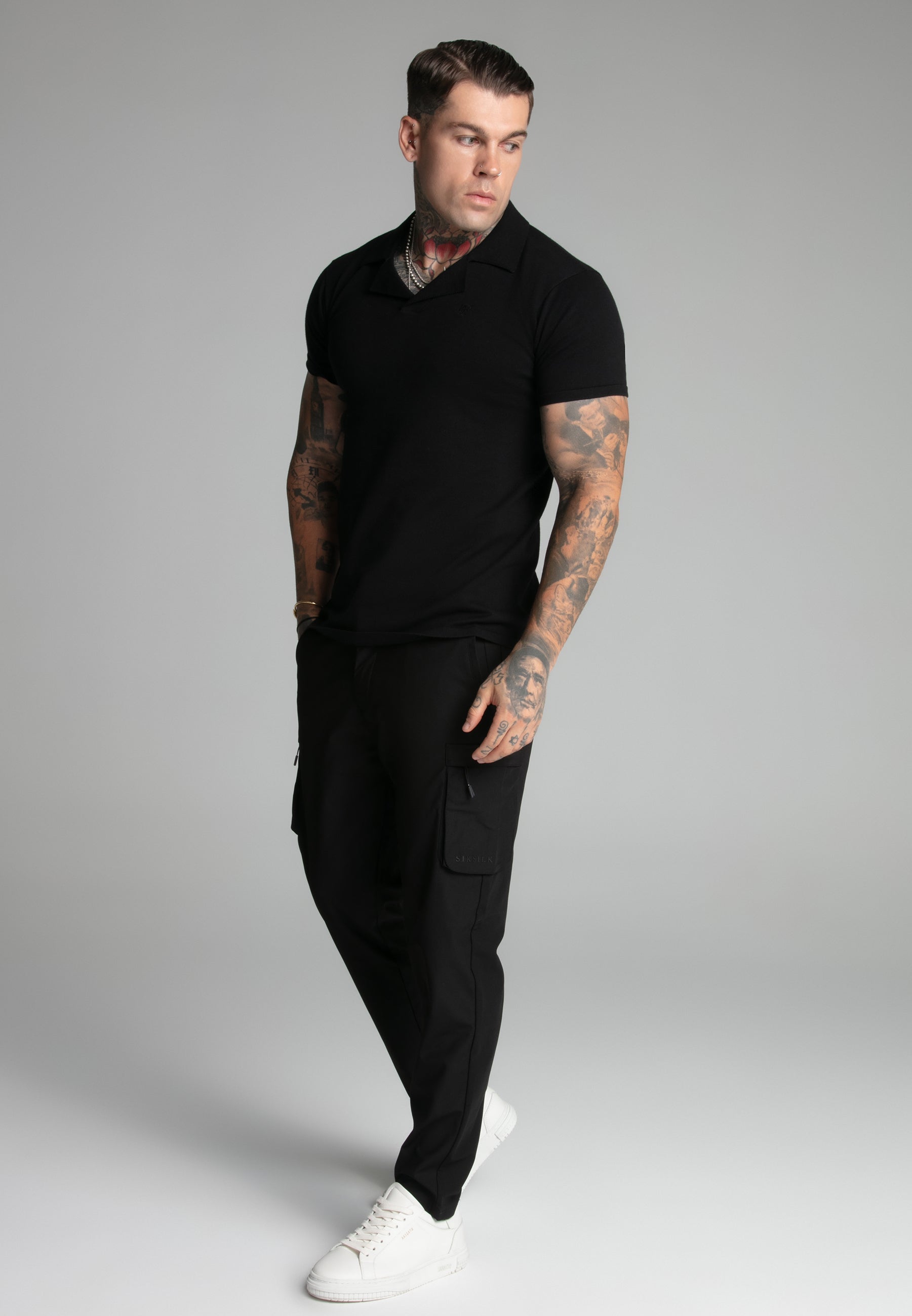 Polo con colletto Revere in nero Magliette SikSilk