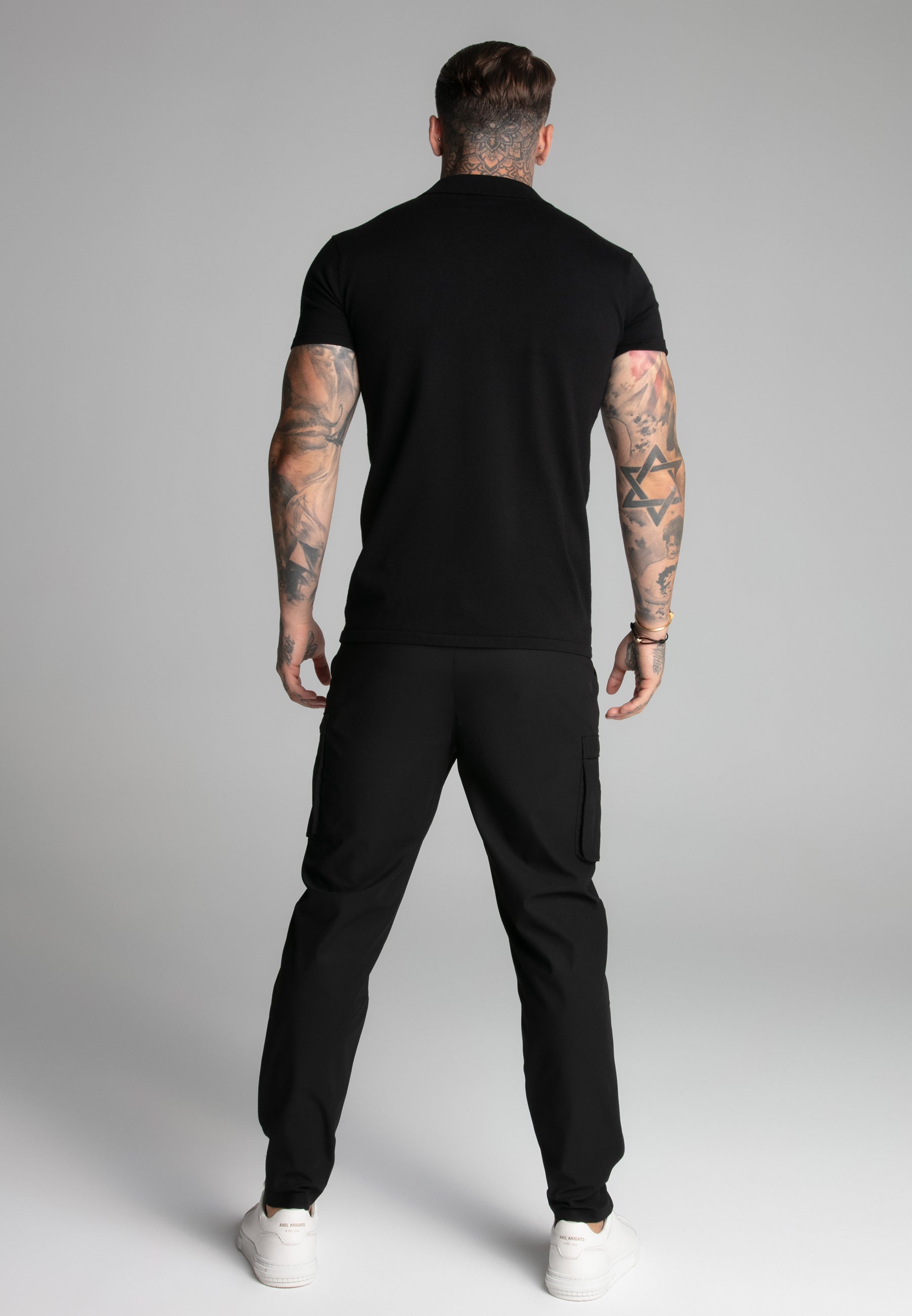 Polo con colletto Revere in nero Magliette SikSilk