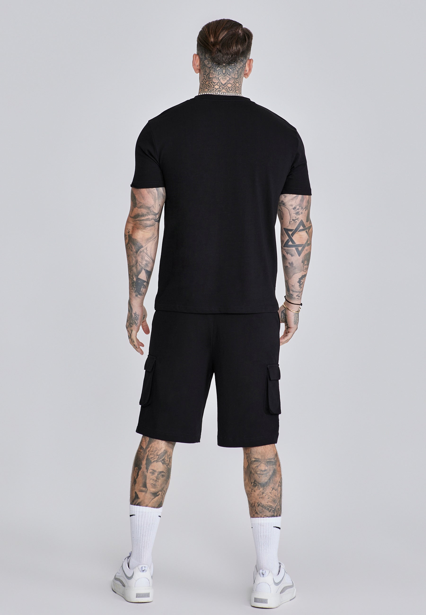 Set di maglietta e pantaloncini neri SikSilk