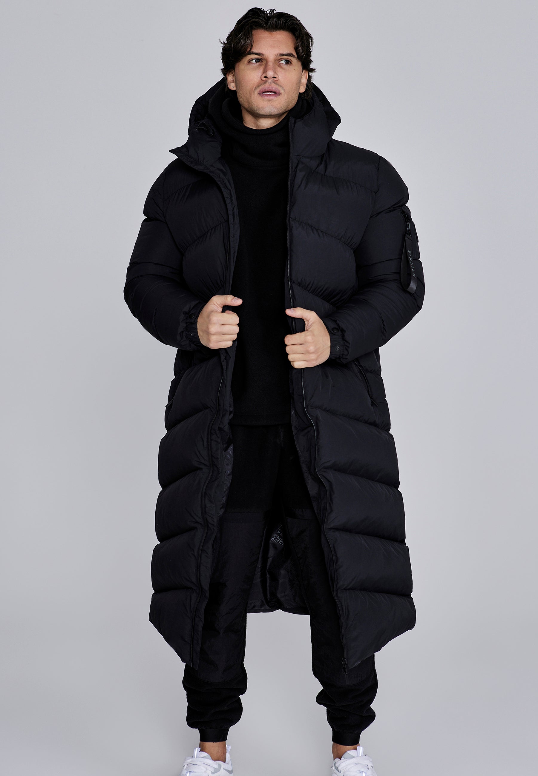Puffer lungo in nero Giacche SikSilk