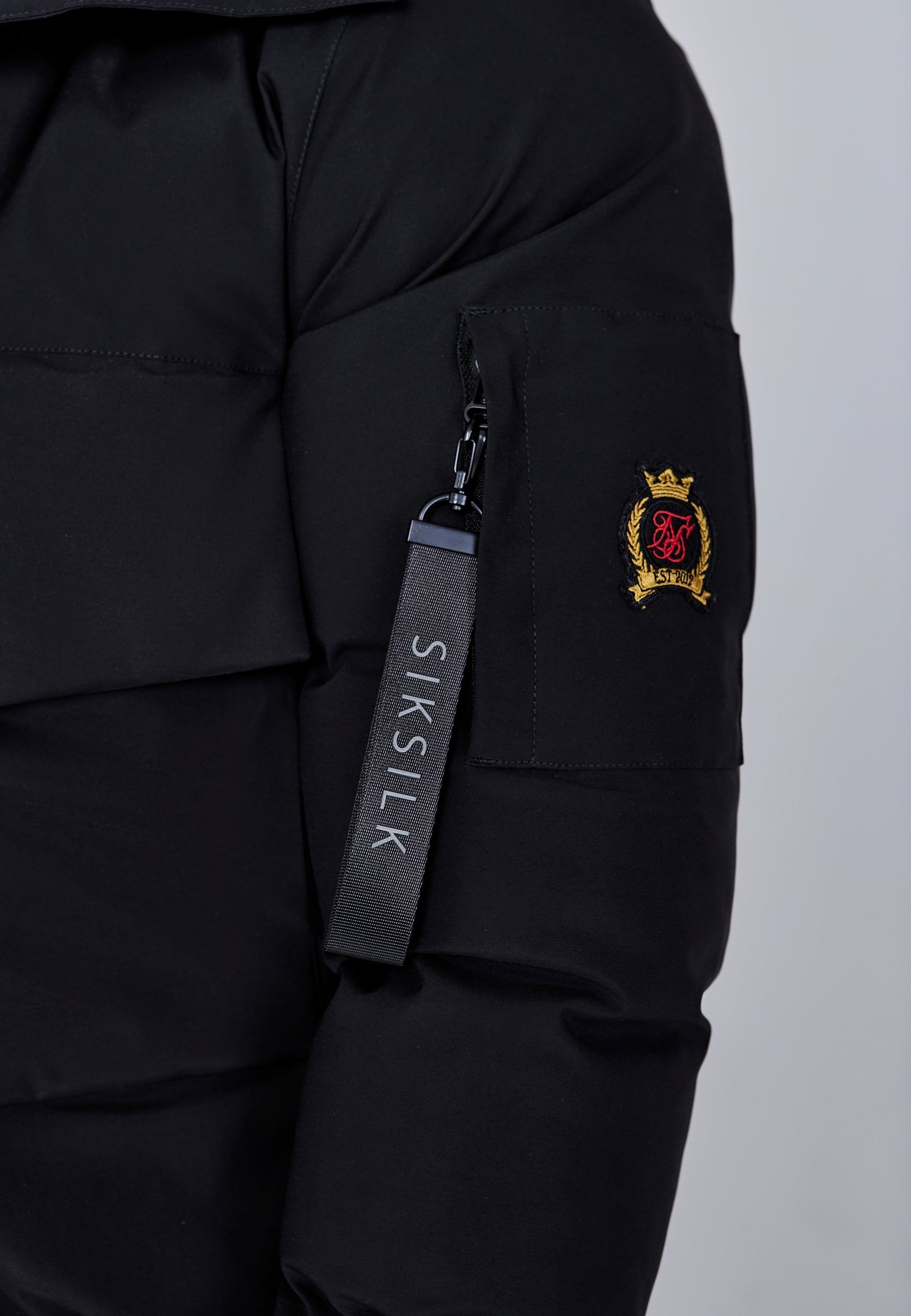 Giacca bomber con cappuccio in nero Giacche SikSilk