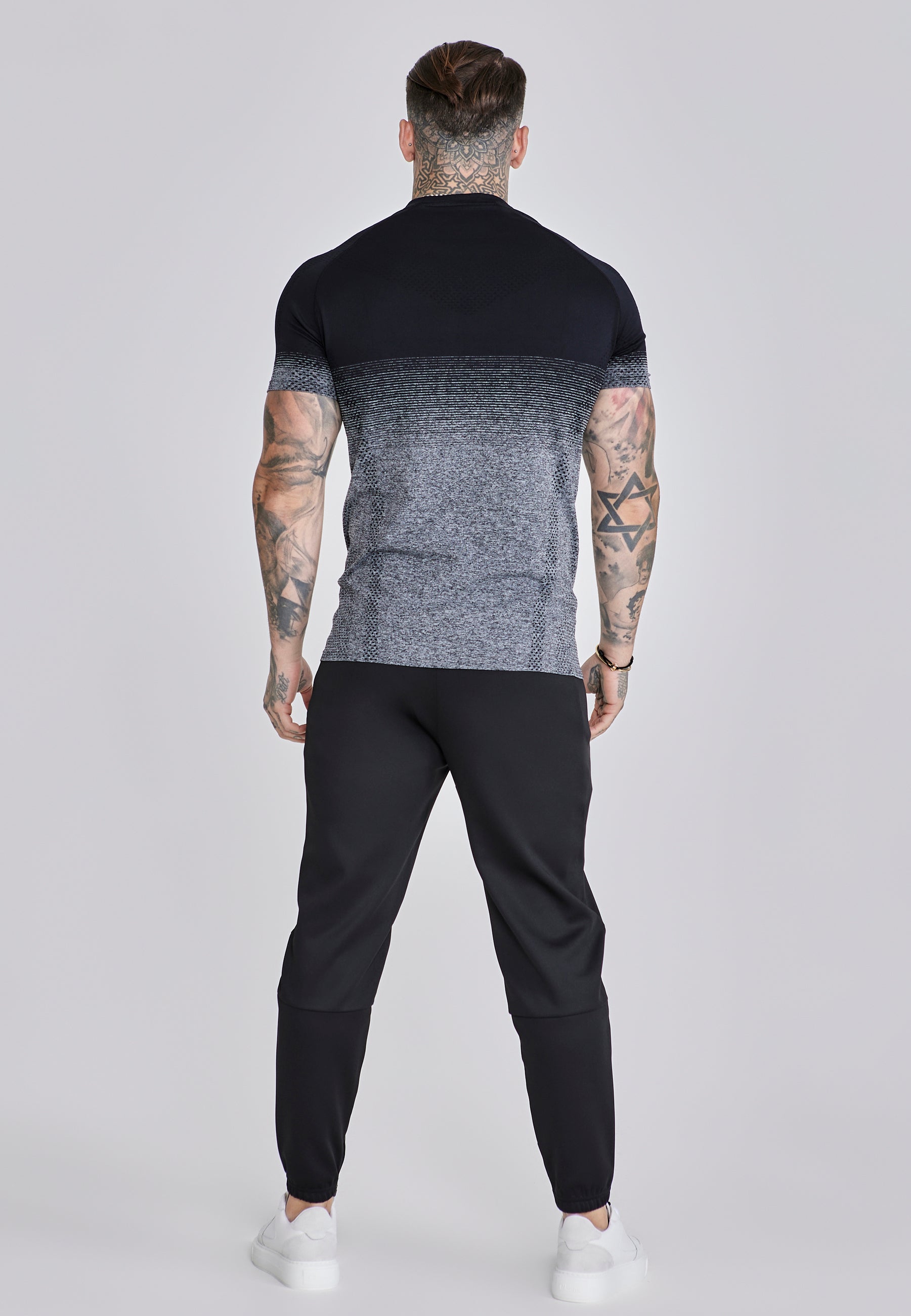 Joggers Tapered in nero Pantaloni SikSilk