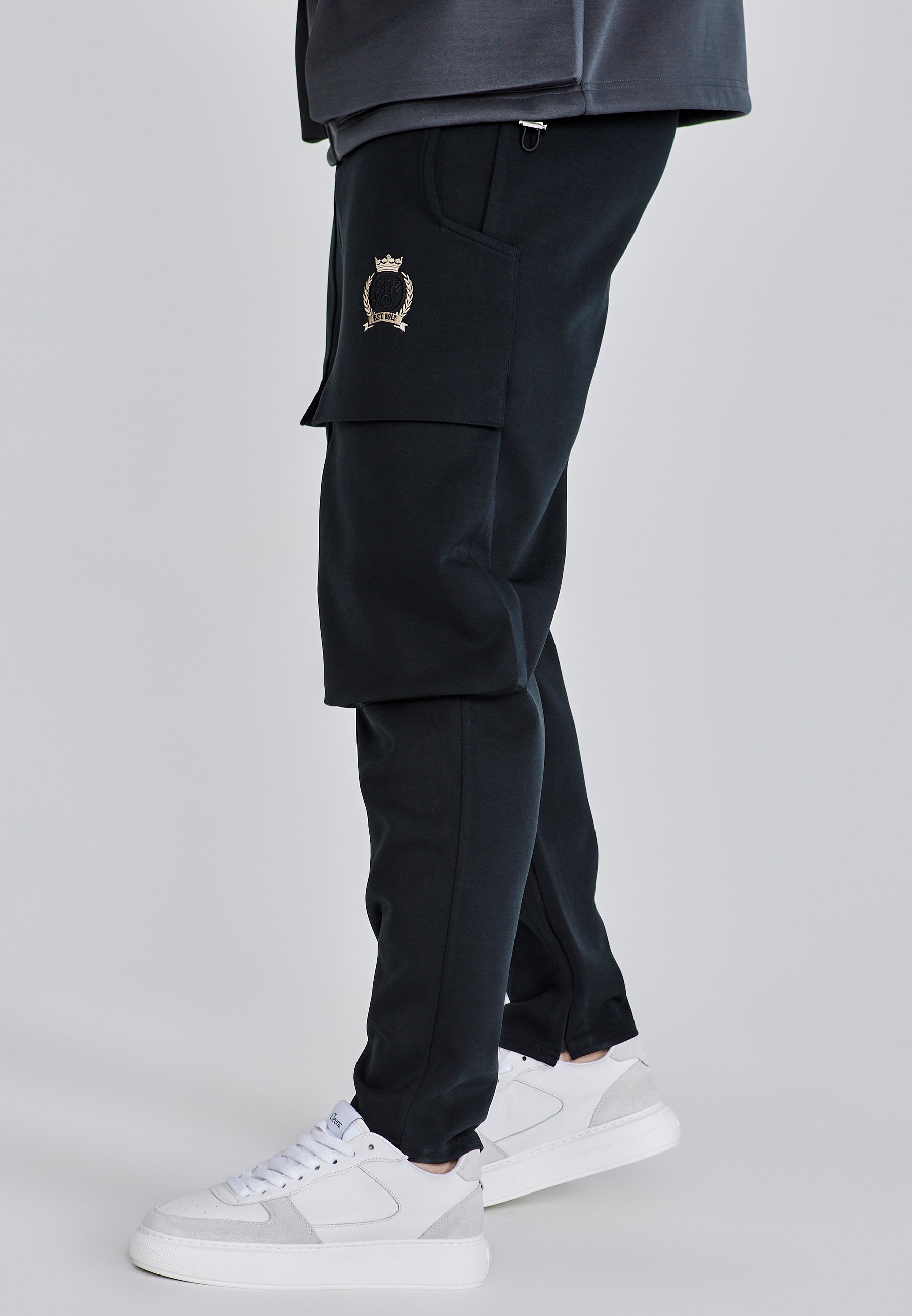 Pantaloni Utility in nero Pantaloni SikSilk
