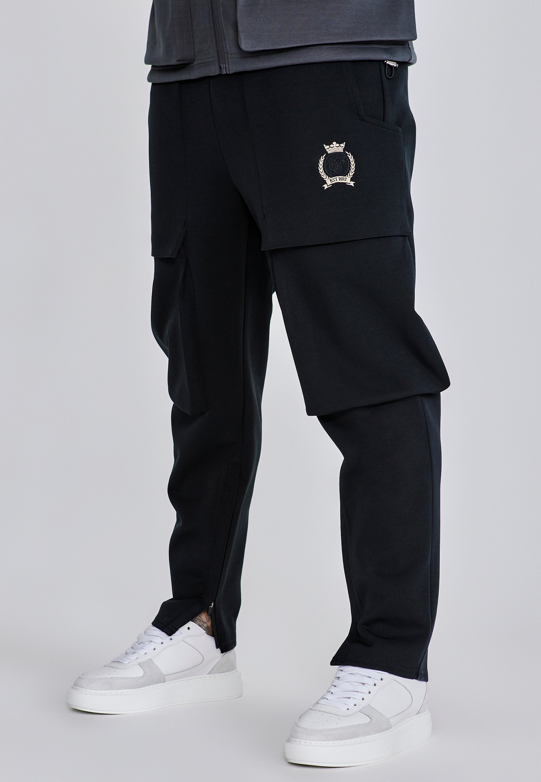 Pantaloni Utility in nero Pantaloni SikSilk
