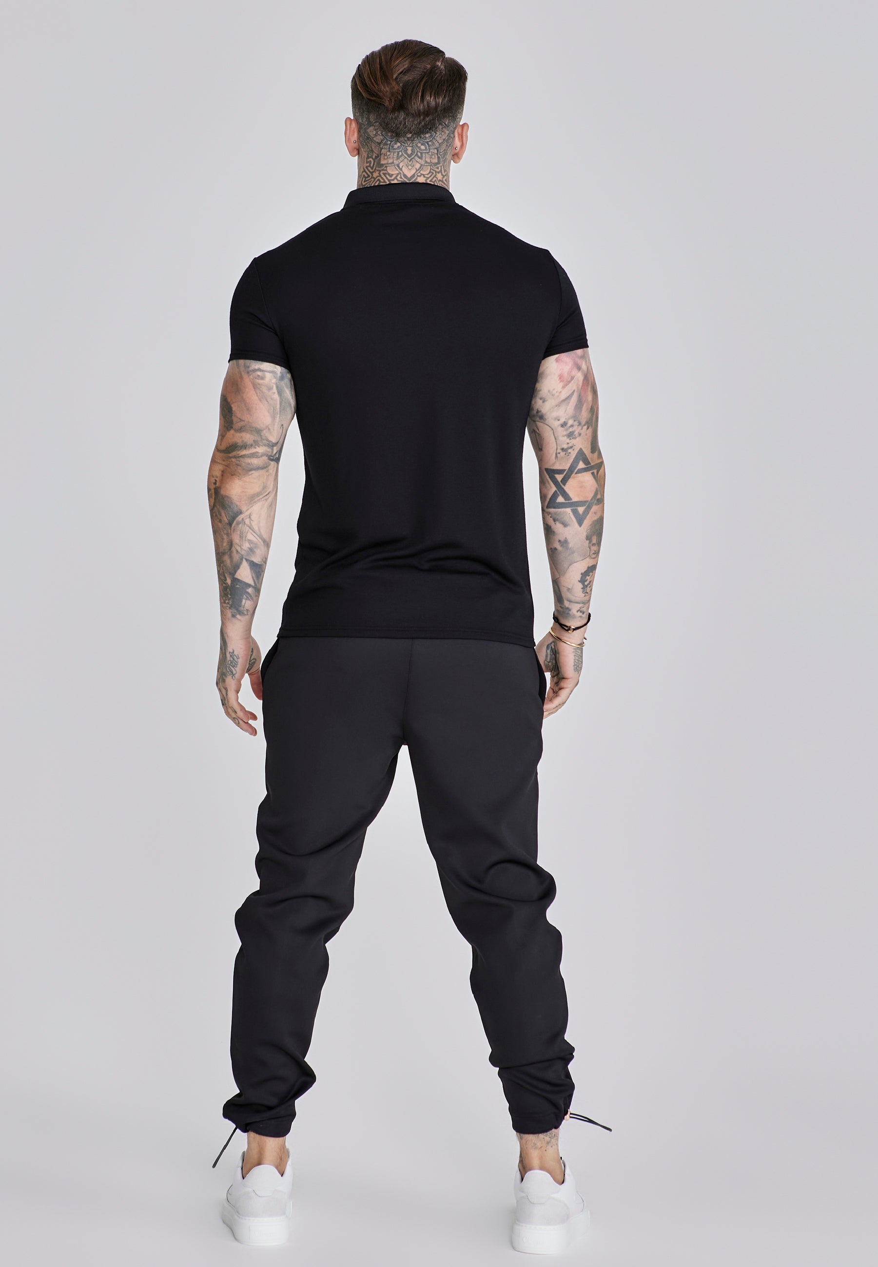 Polo intelligente in nero Magliette SikSilk
