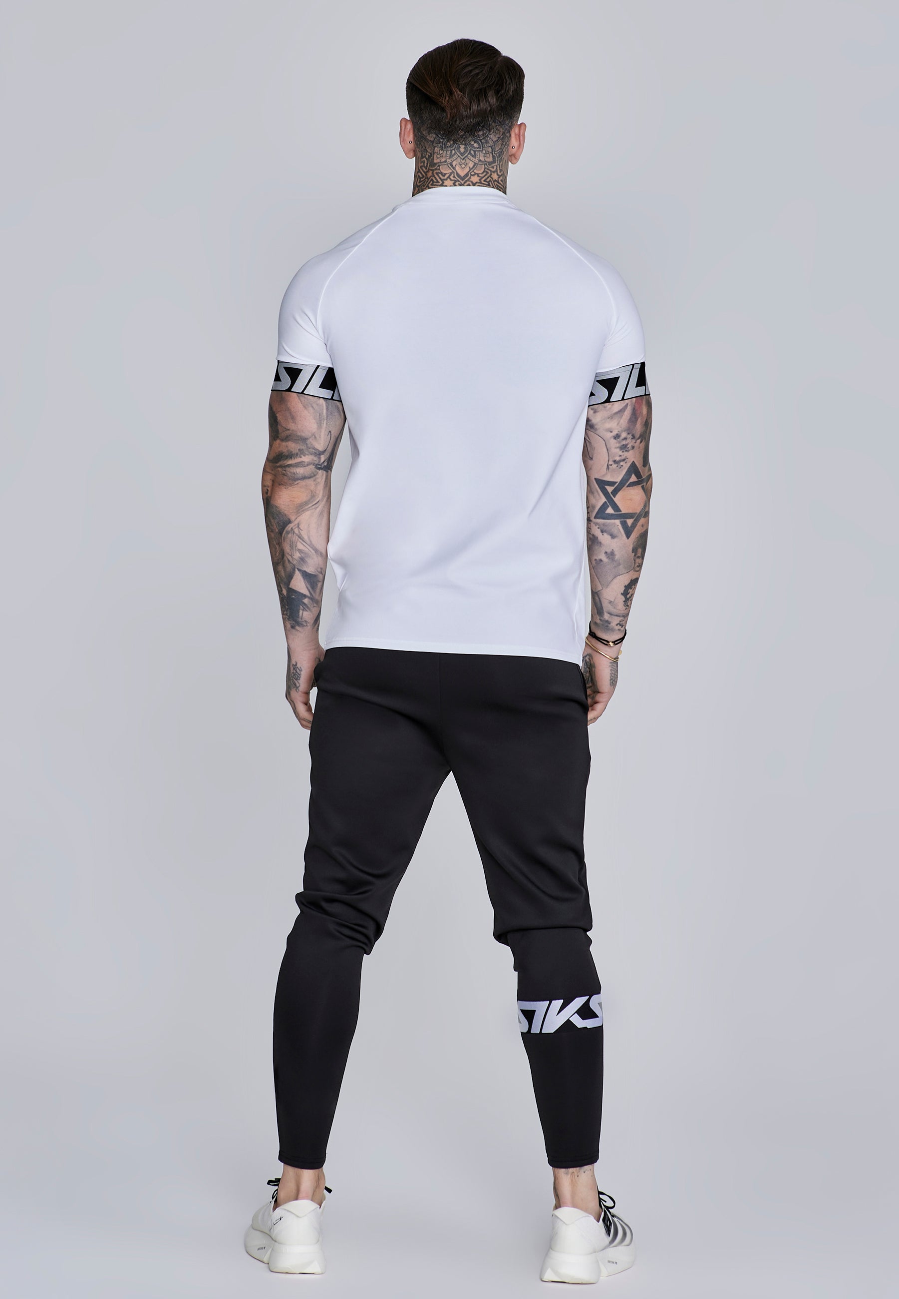 Joggers muscolosi in nero Pantaloni SikSilk